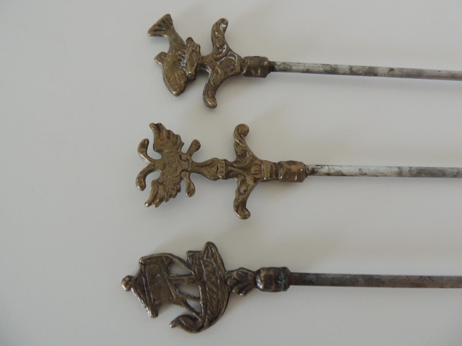 Brass set of (6) Grilling Skewers.
Depicting animals, fish and boat.
Size: 1
