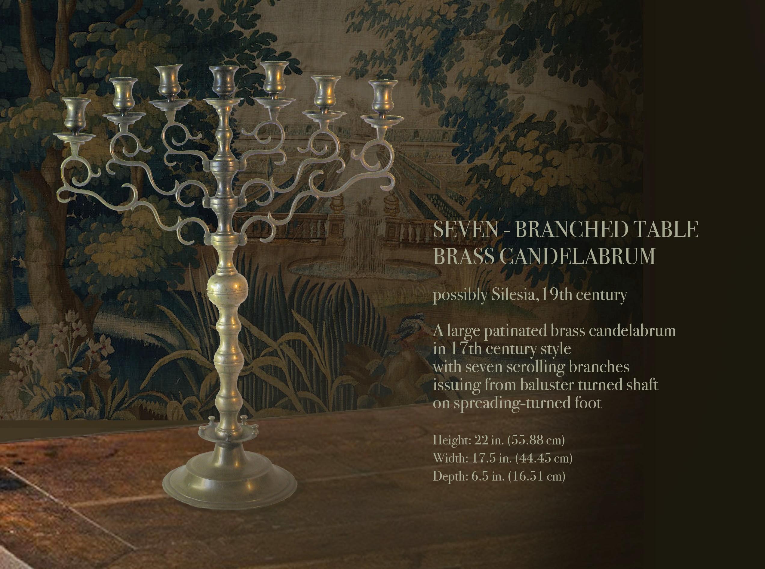 Seven - branched table
Brass candelabrum.

Possibly Silesia, 19th century.
(Poland/Czech Republic).

A large patinated brass candelabrum
in 17th century style
with seven scrolling branches
issuing from baluster turned shaft
on