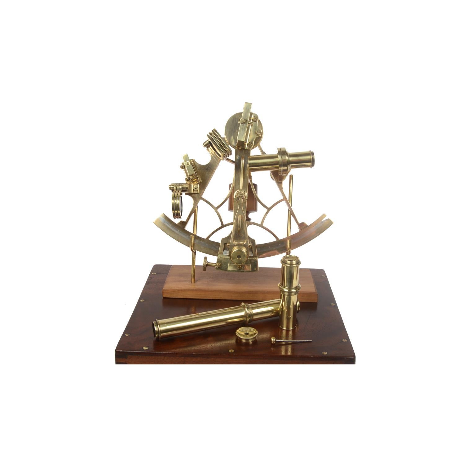 Brass sextant made in the mid-19th century, complete with lenses and placed in its beautiful original mahogany box complete with key and brass handle and hinges. Vernier of engraved silver, boxwood handle, 3 colored glasses for the fixed mirror and