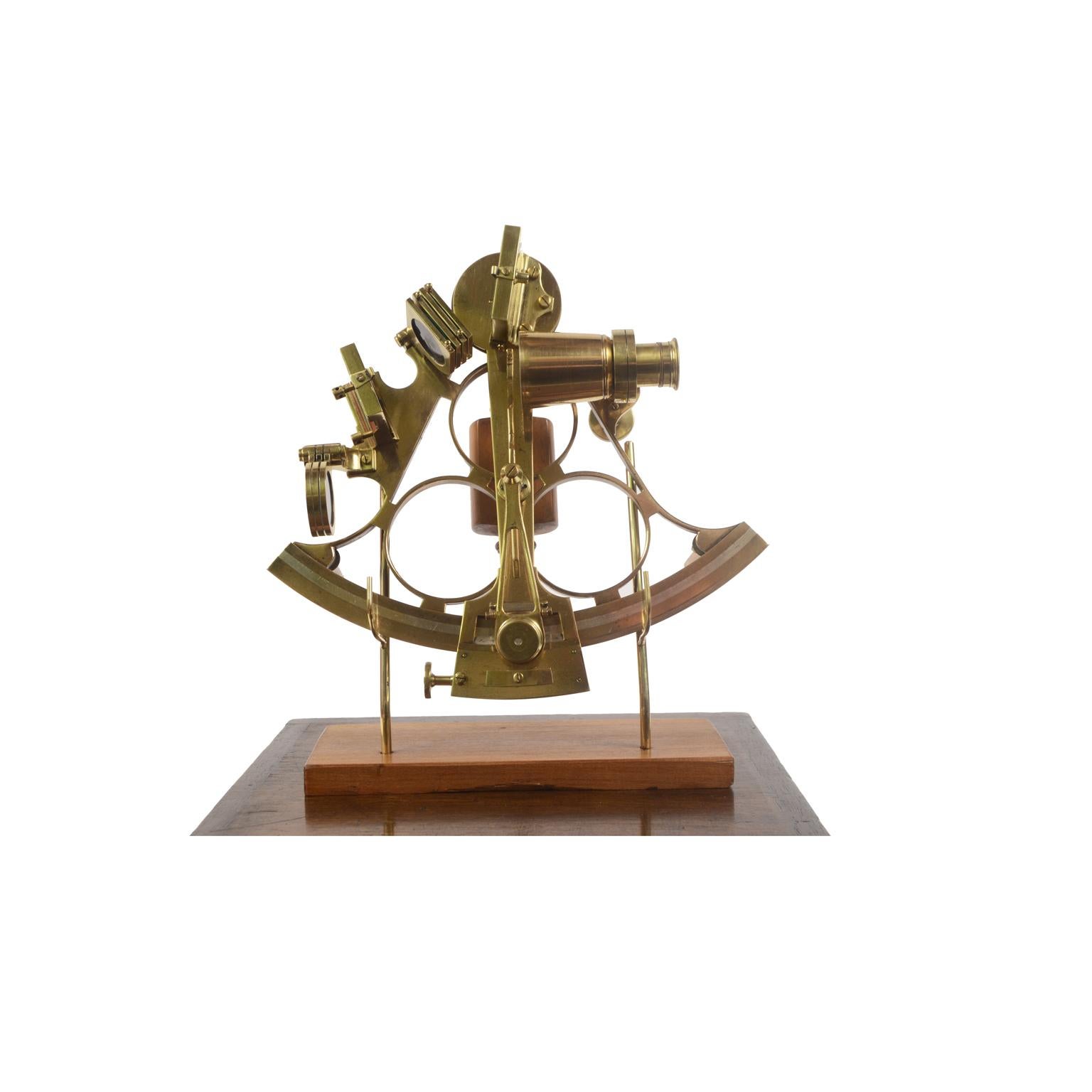 Brass sextant made the second half of the 19th century, placed in its original wooden box. Vernier of engraved silver, handle of boxwood, 3 colored glasses for the fixed mirror and 4 for the mobile one, a telescope, a microscope for reading the