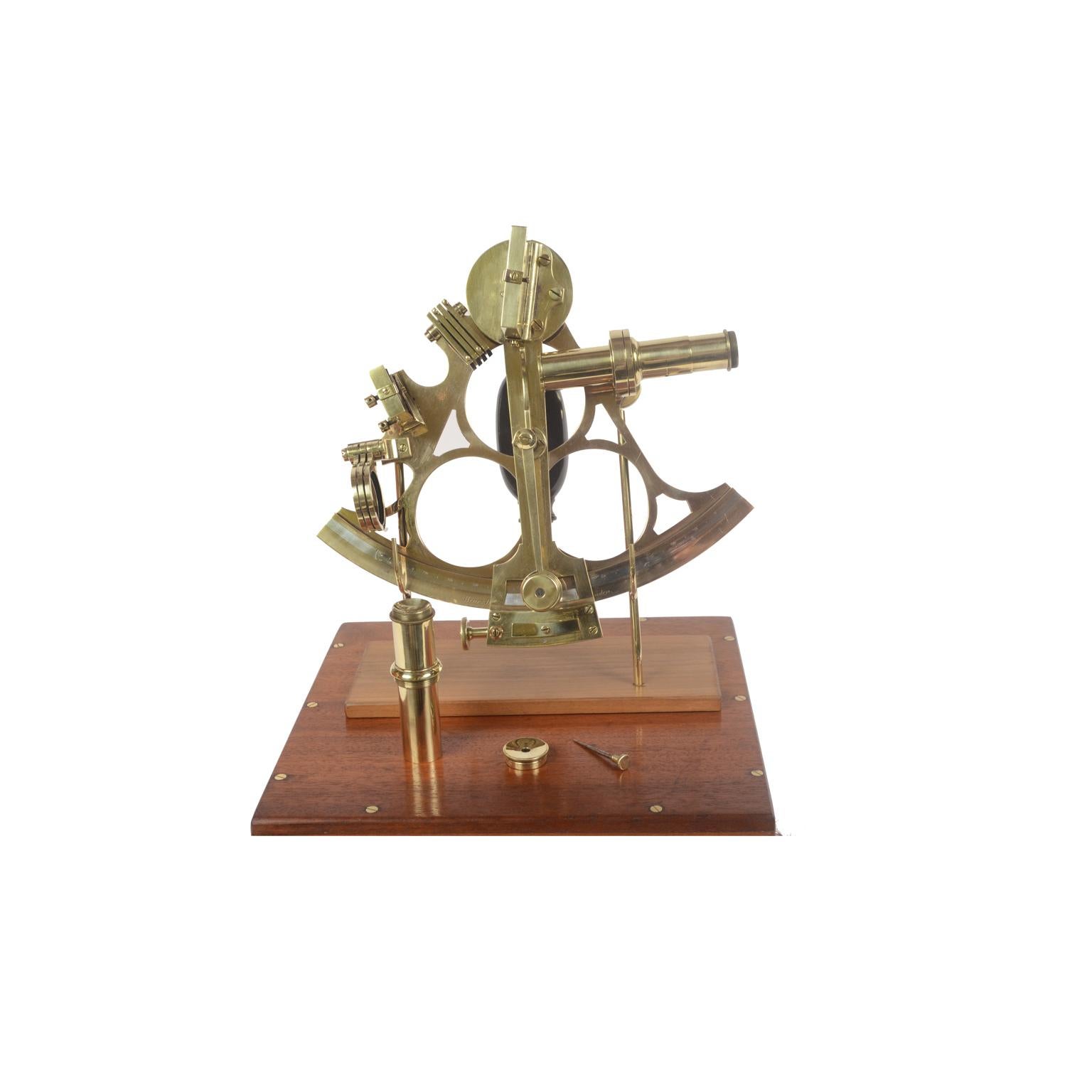 Brass sextant signed Henry Hughes & Son 59 Fenchurch St. London Limited, early 1900s, instrument complete with two telescopes, a filter and an adjustment key and placed in an elegant original square box of mahogany wood with hinges and closing hooks