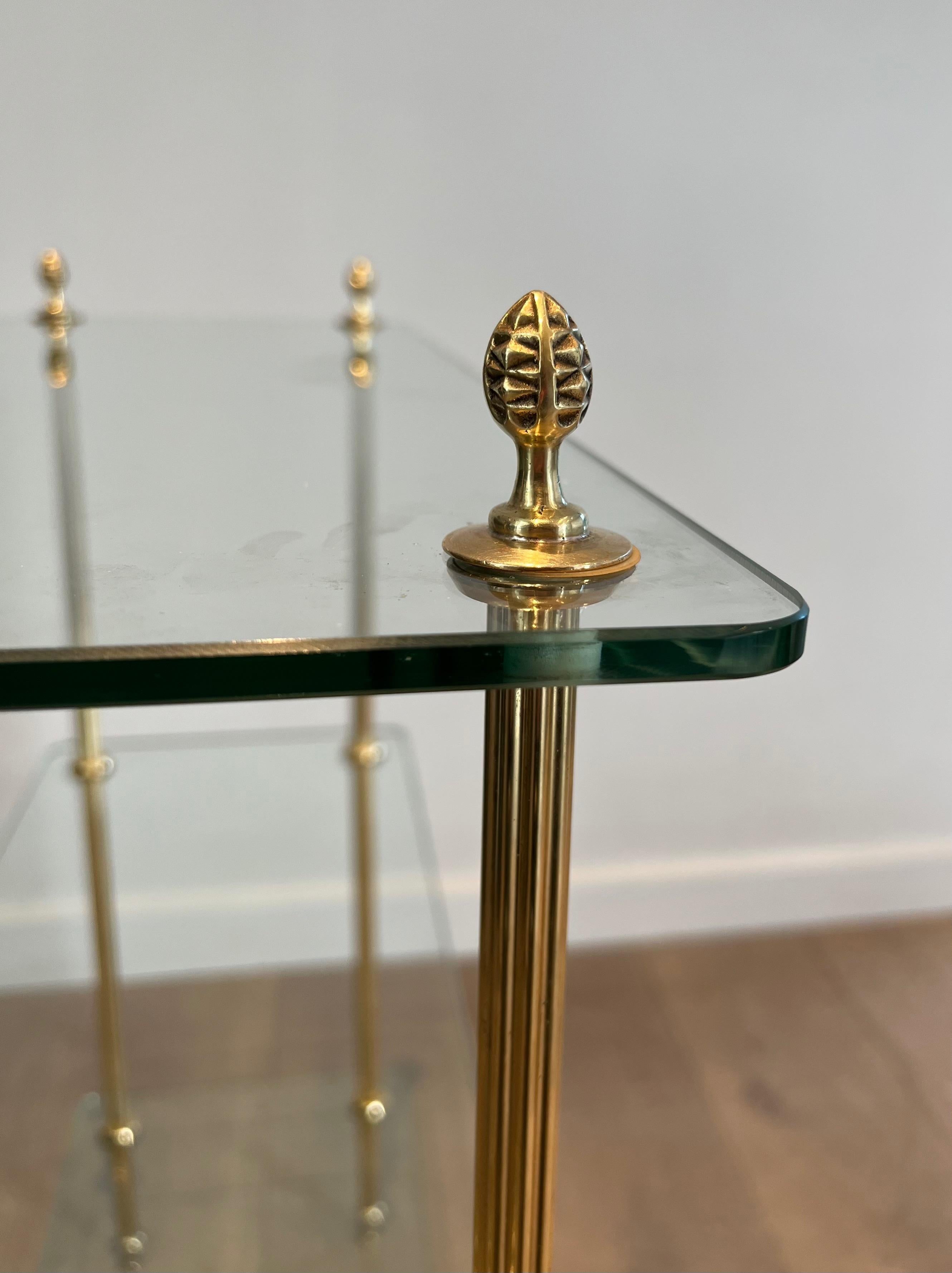 Brass shelf with glass slabs. French work by Maison Jansen. Circa 1940 10