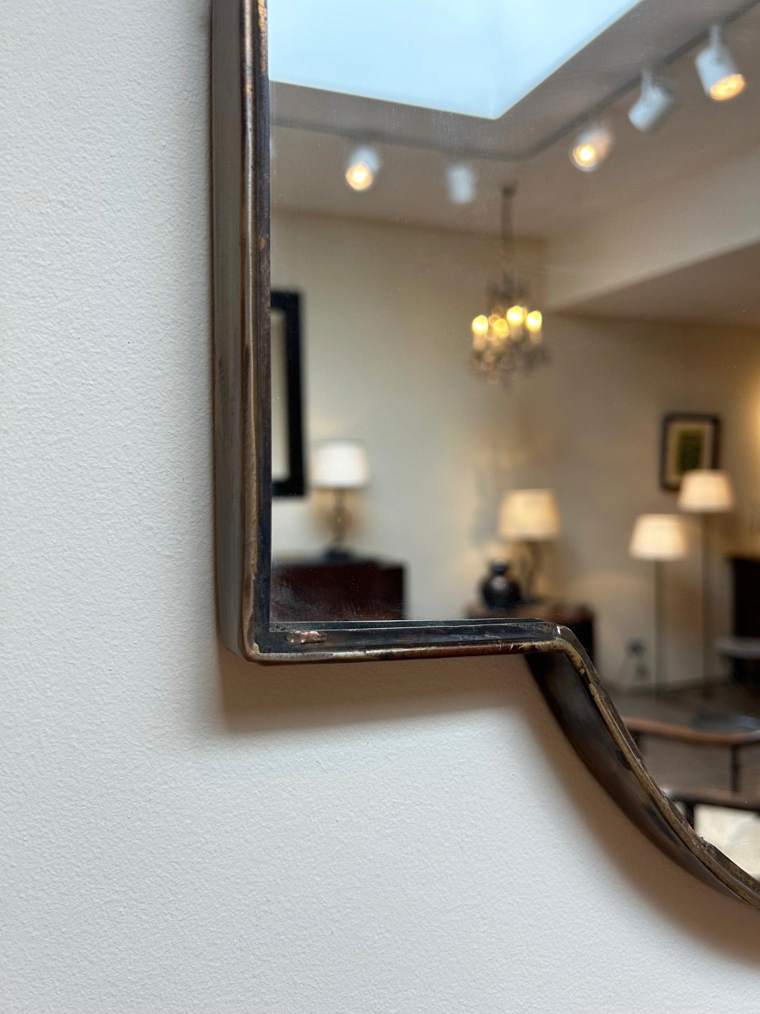 Mid-Century Modern Brass Shield Mirror For Sale