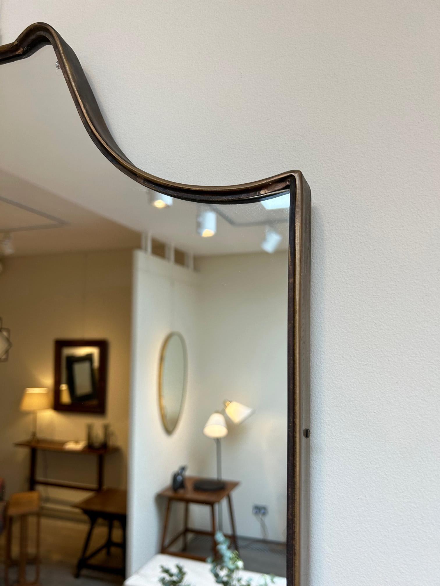 Mid-20th Century Brass Shield Mirror For Sale