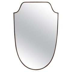 Specchio a scudo in ottone
