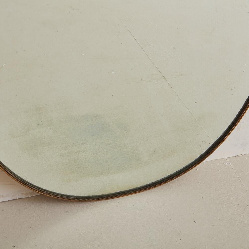 Late 20th Century Brass Shield Mirror with Beaded Fillet