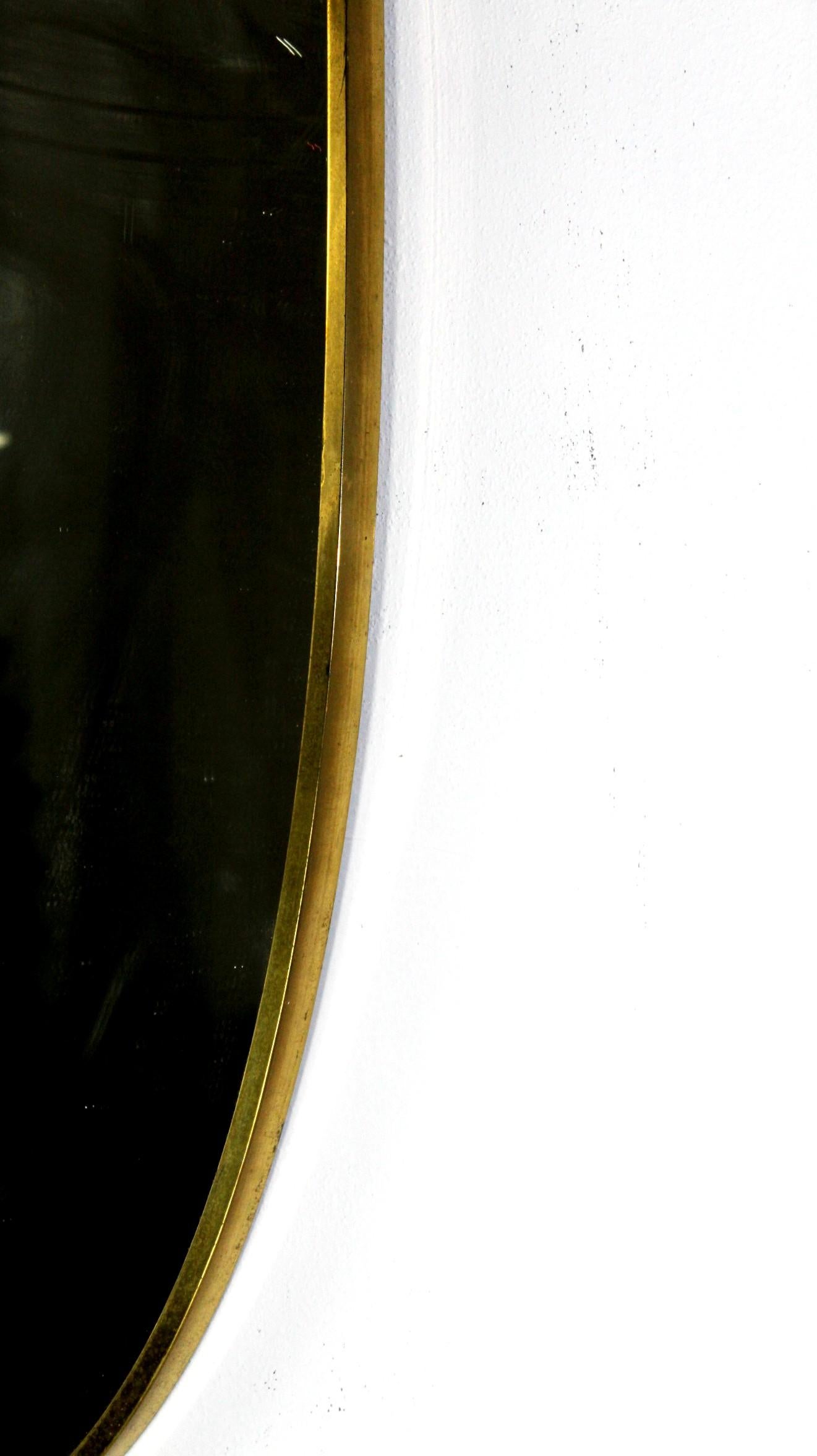 Mid-Century Modern Brass shield shape italian mirror