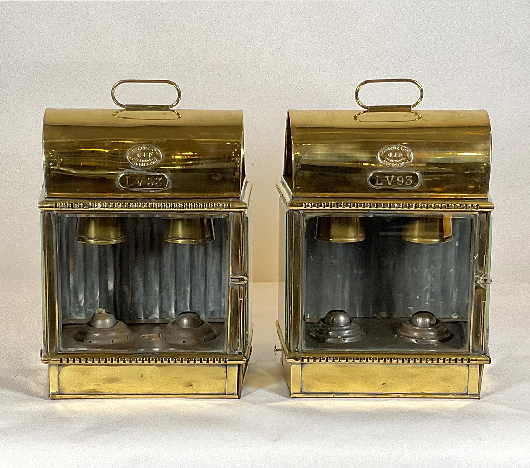 Fabulous pair of British ship’s lanterns from the British light vessel “LV-93”. The original vessel was built by Philip and Son of Dartmouth in 1938. The vessel was in the North Sea unit 2004. The lanterns are solid brass with a lacquer finish. With