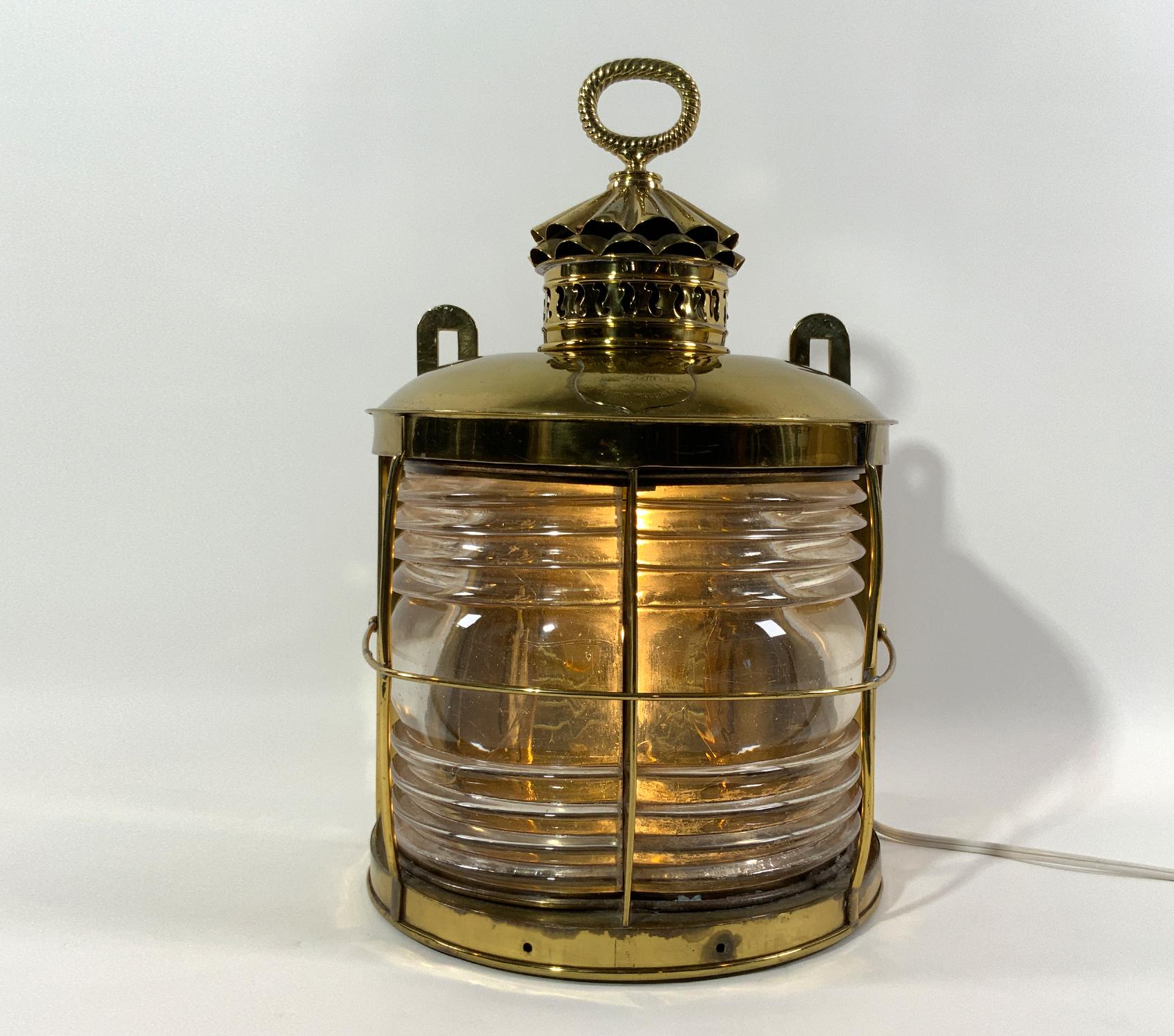 Solid brass nineteenth century ships masthead lantern with brass label from 