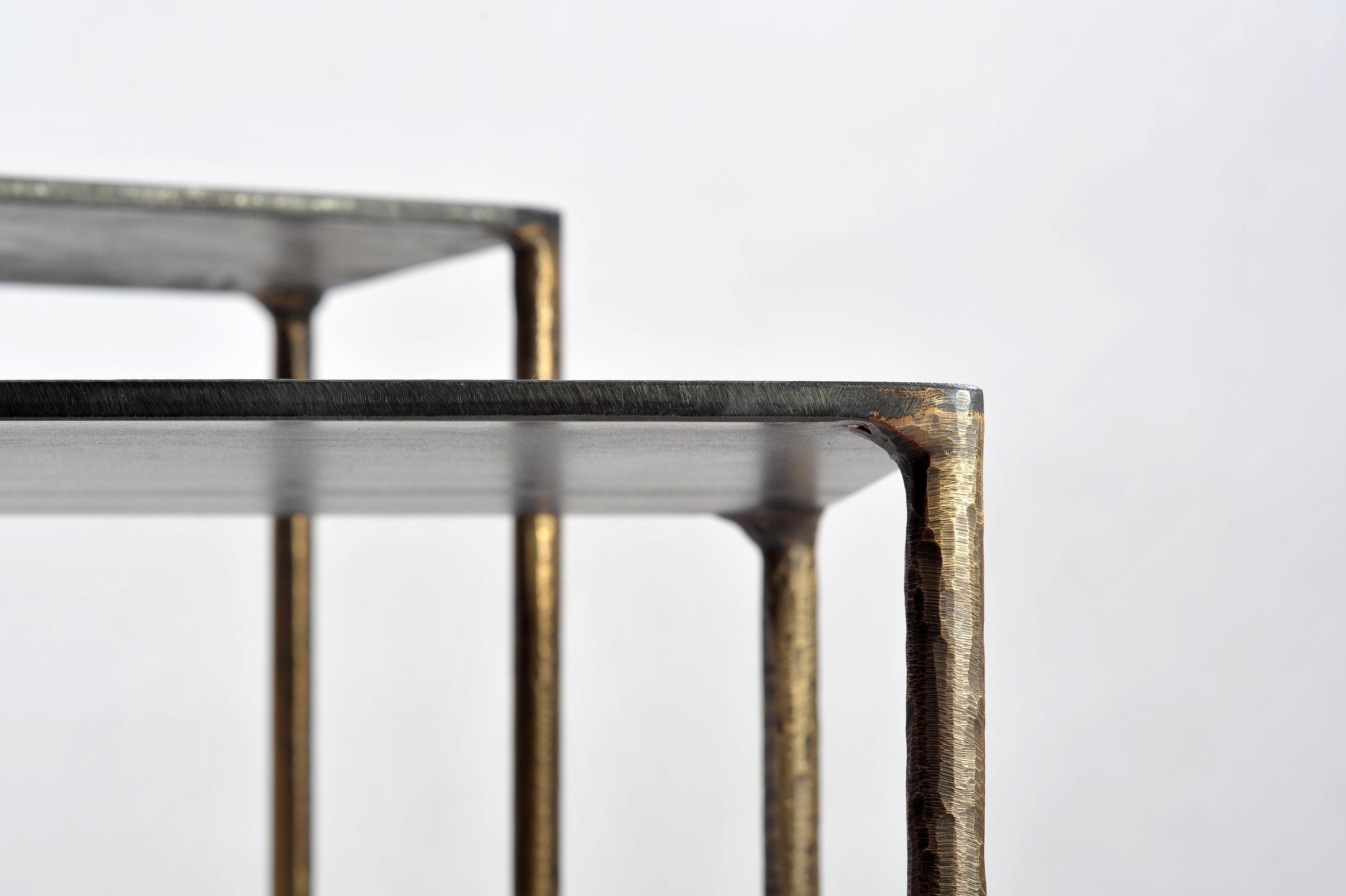 Brass side table signed by Lukasz Friedrich
Textured side or coffee table
Materials: Legs, patinated brass; top, patinated and waxed steel
Dimensions: 
D 28 cm, L 38 cm, H 50 cm
D 38 cm, L 68 cm, H 40 cm
Signed and dated

Lukasz Friedrich