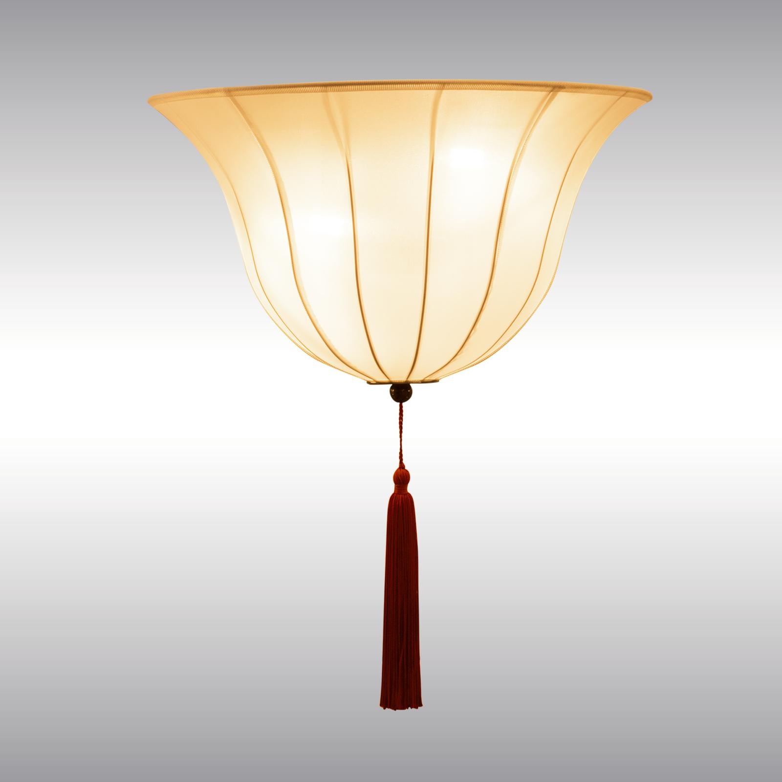 Elegant Wall Sconces, Variation of the Wall-Lamp from the Fabric-Showroom of the Wiener Werkstaette. Measures are without tassel. Just with plain-colored fabric.
USA and CAN:
All electrical components according to the UL regulations.
With an