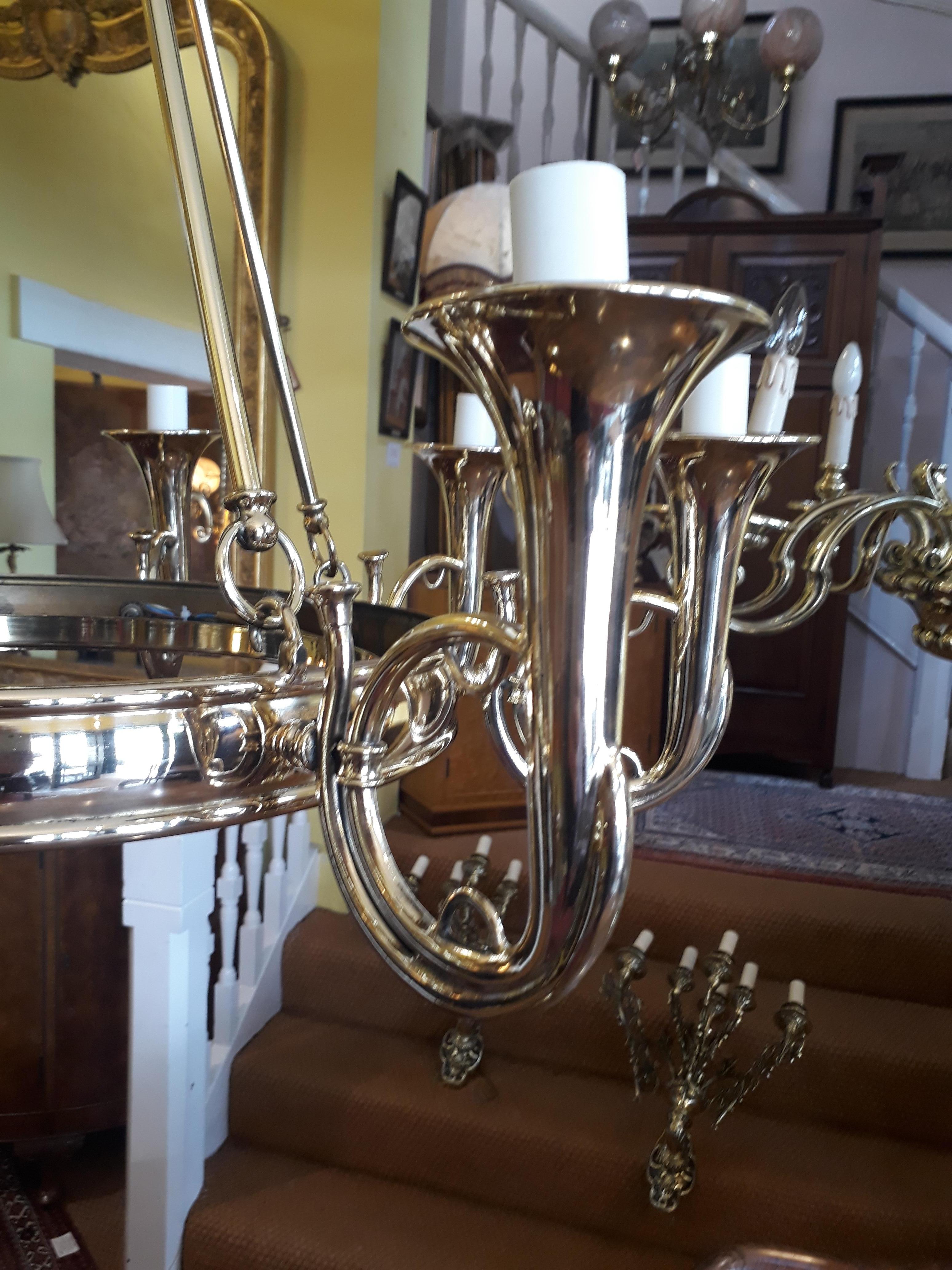 Mid-20th Century Brass Eight Arm Chandelier For Sale