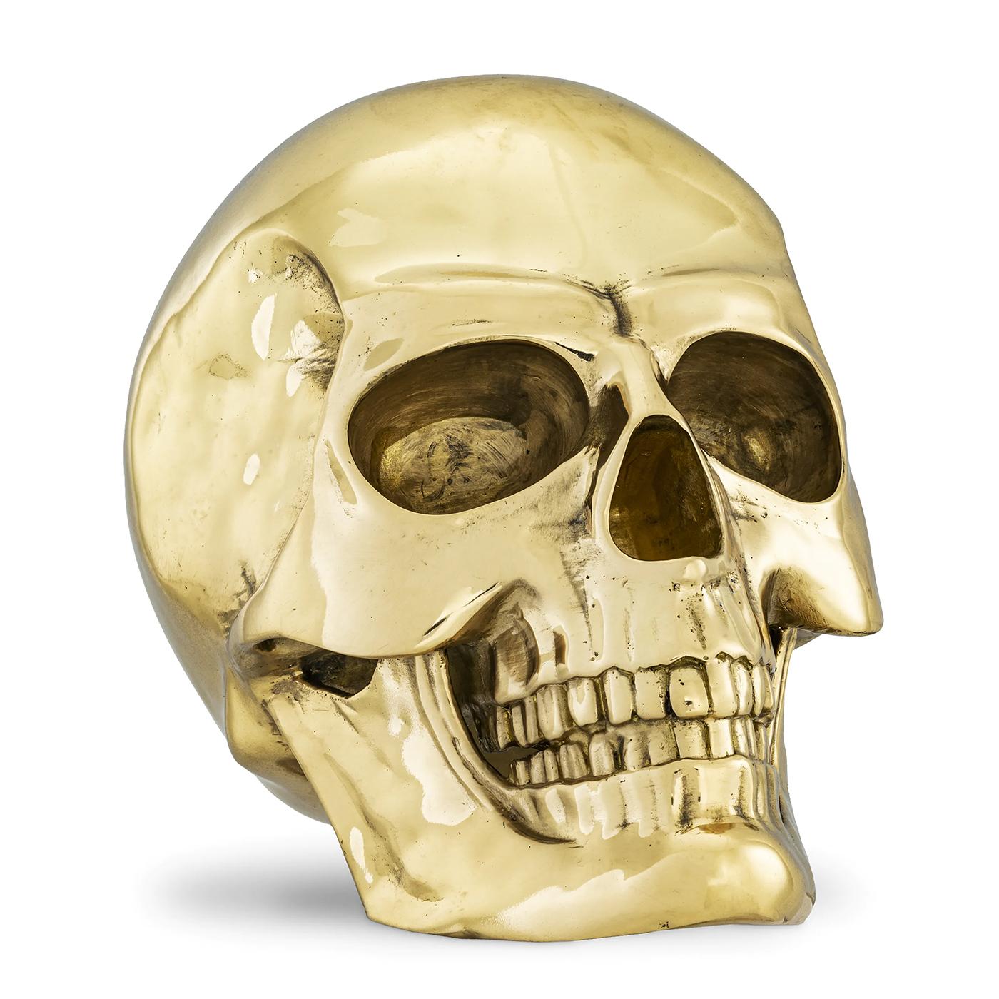 Sculpture brass skull all in solid.
brass in polished finish.