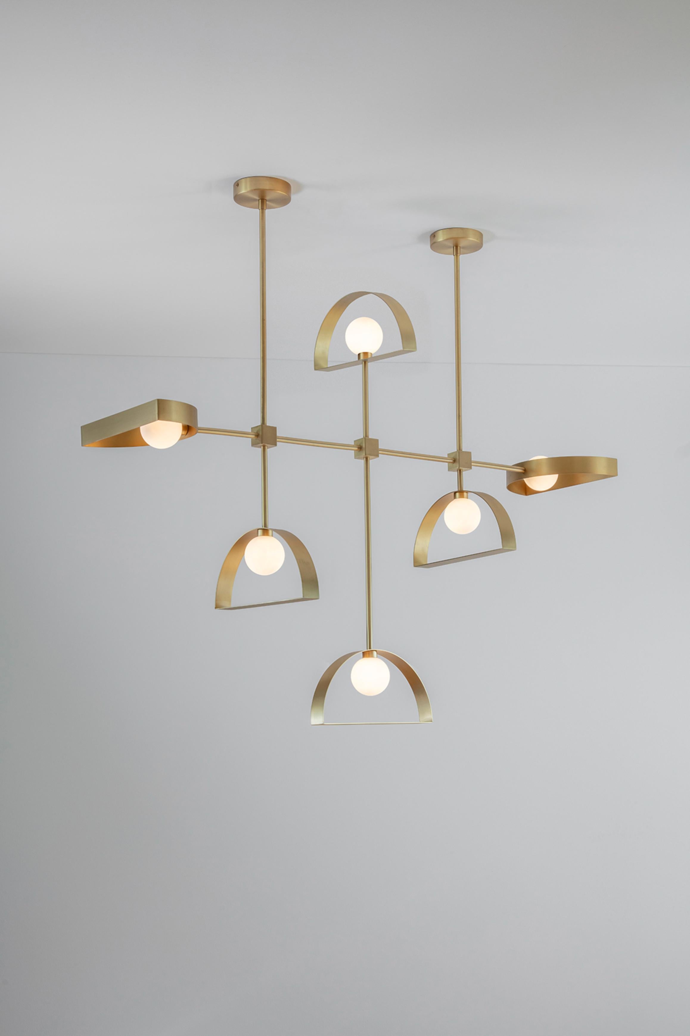 Brass Sphere and Cut Circle Pendant Lamp by Square in Circle
Dimensions: W 120 x H 120 x D 30 cm
Materials: Brushed brass finish, white frosted glass

This uniquely modular suspension light can be customized to different sizes and finishes. The