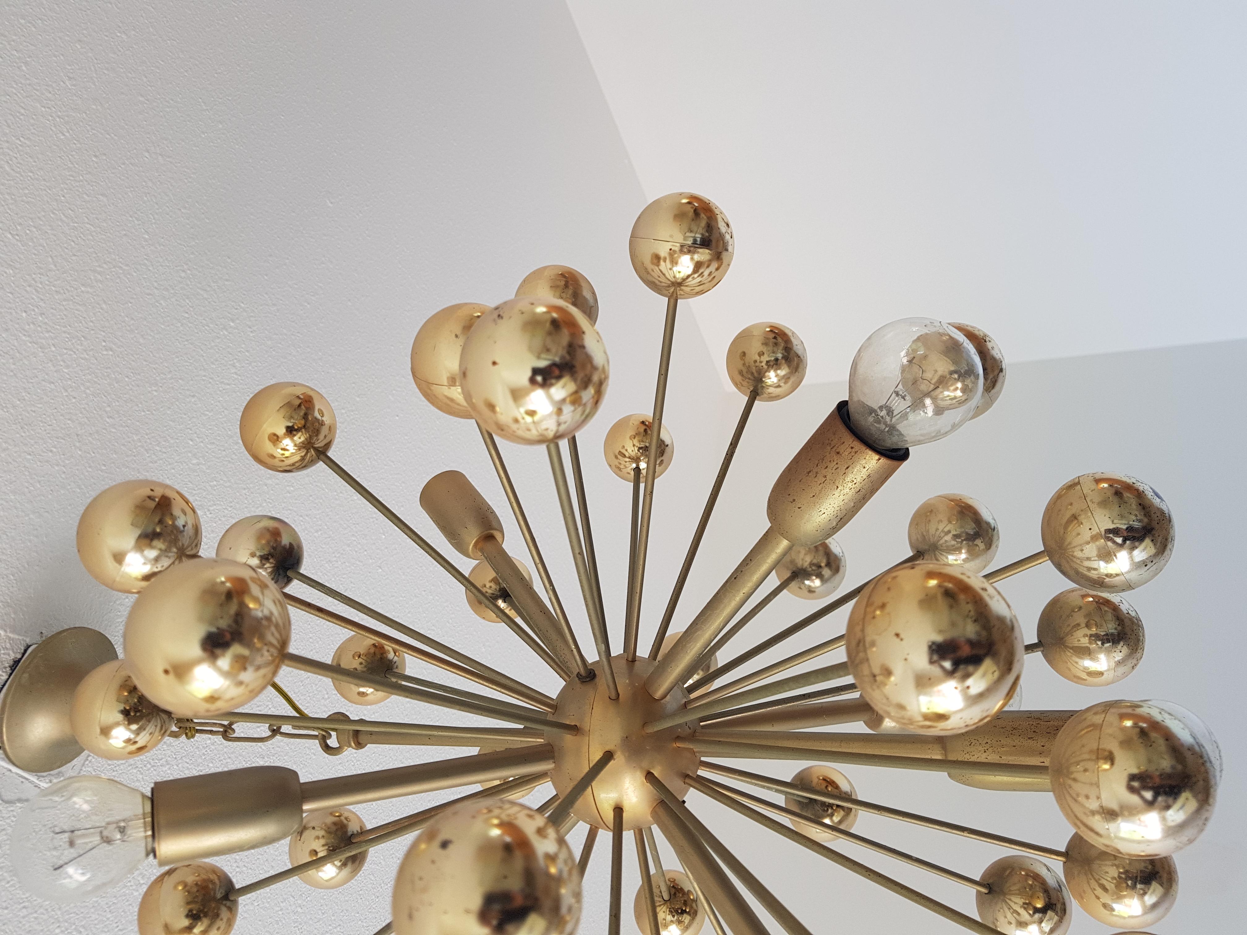 Vintage Sputnik chandelier, Spage Age normally these are chrome but I found one in brass and gold, this model is very rare and from the 1970s.
its like a molecule chandelier.
Comes with free bulbs, and free and fast shipping

Make me an offer


  