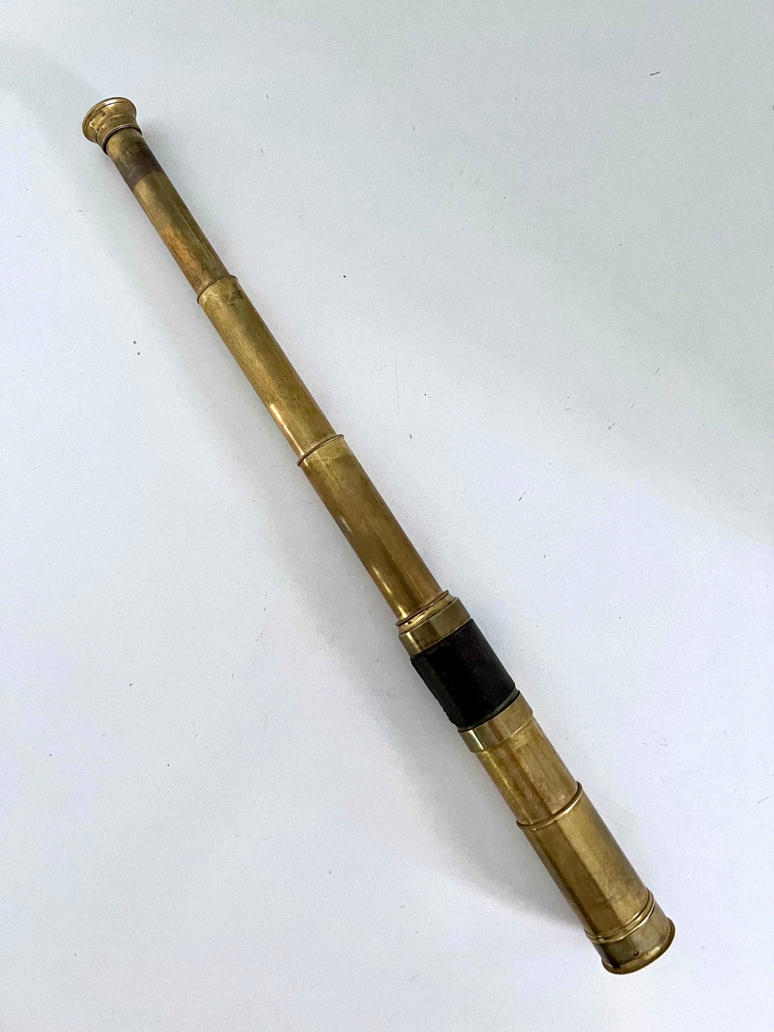 A wonderful retracting Spyglass or telescope with leather handle. The piece actually works very well, but is just as nice as a decorative piece. Beautifully crafted and with just the right amount of patination to look great in any setting - desk,