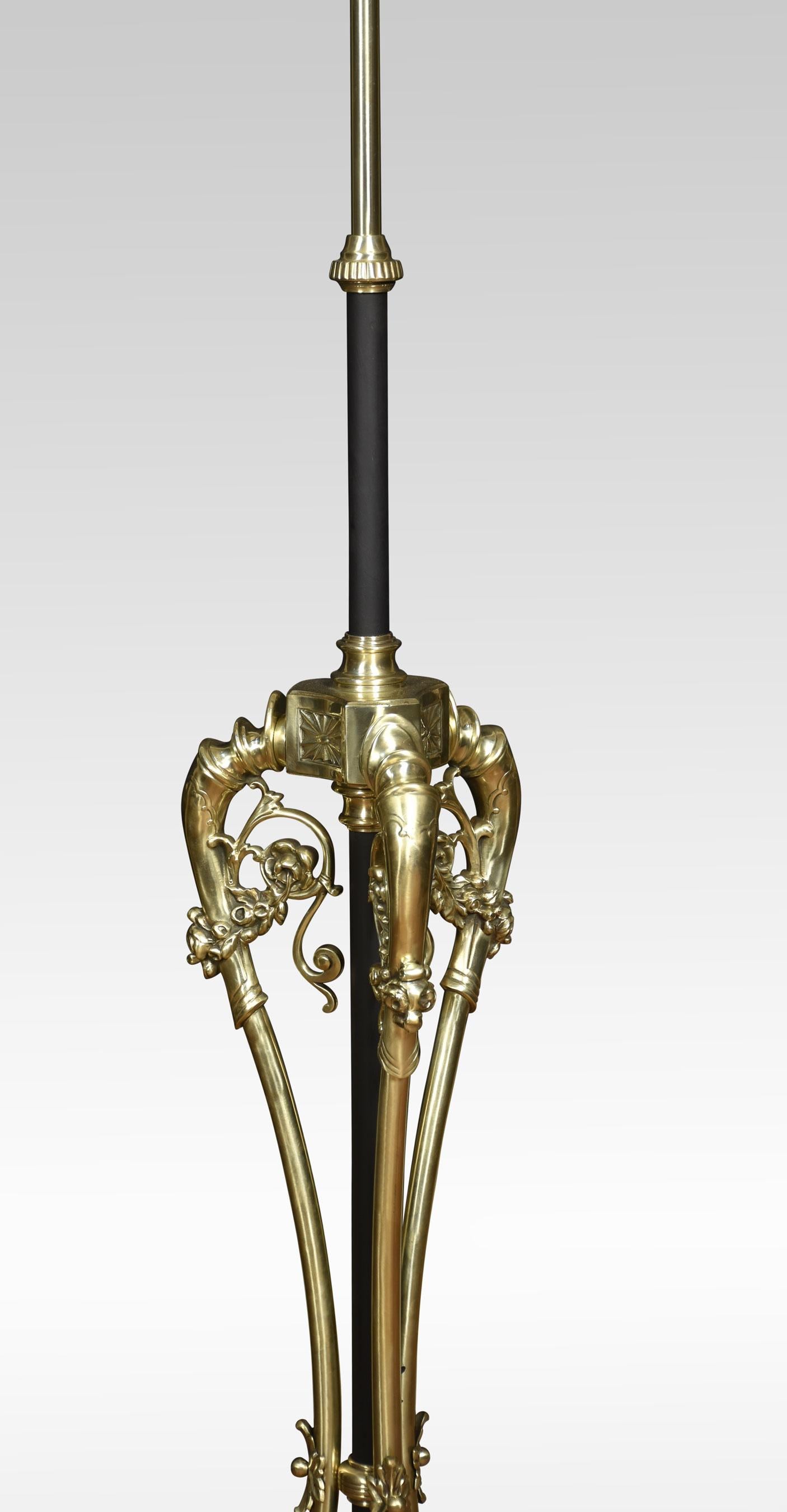 Brass standard lamp, with a circular adjustable reeded ebonized column. Raised up on shaped splayed base with scrolling feet. The lamp has been rewired and tested.
Dimensions
Height 50 Inches adjustable to 80 Inches
Width 18 Inches
Depth 18