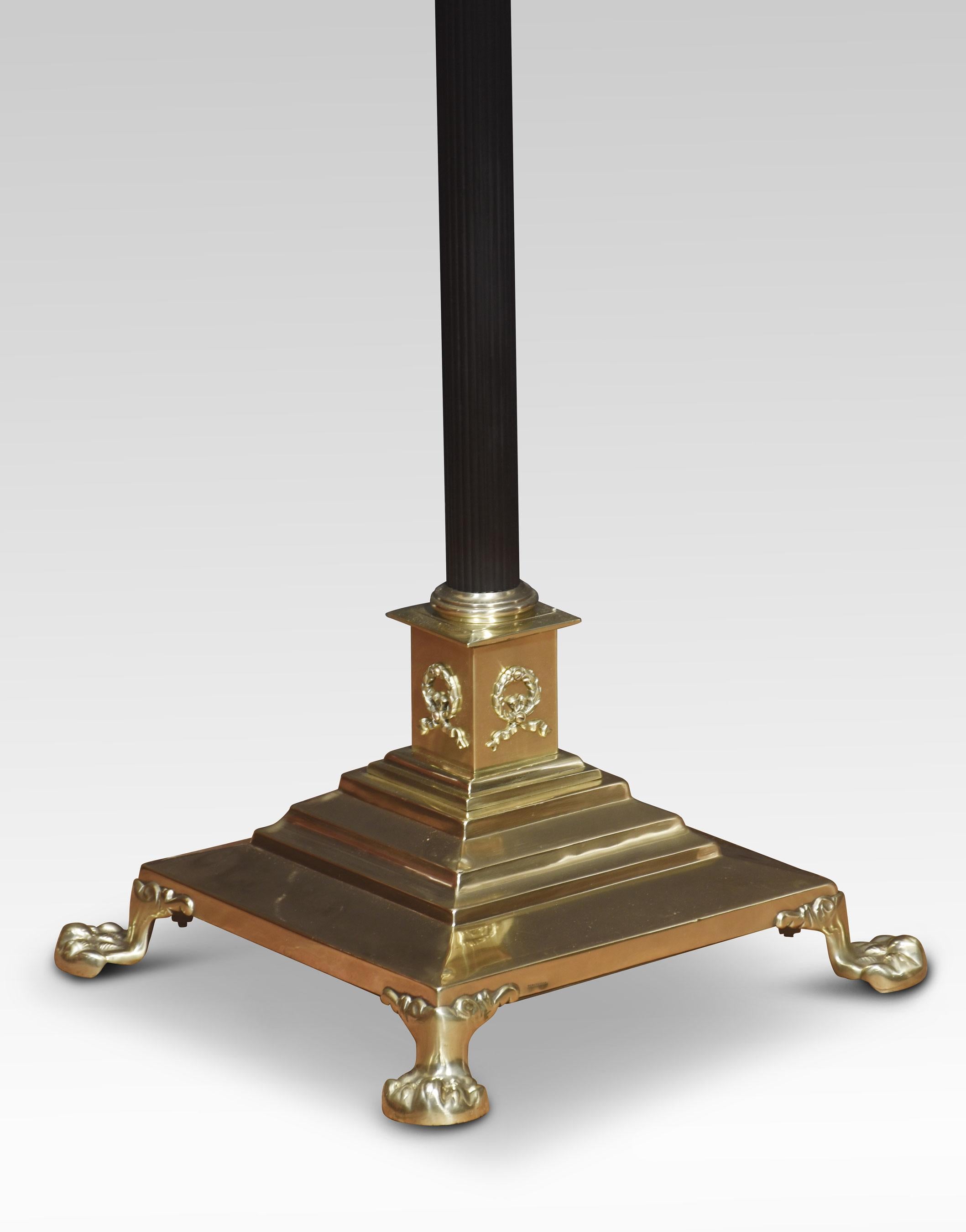 19th Century brass standard lamp. Having a Corinthian column and adjustable stem, raised up on a stepped square base terminating in paw feet. Converted for electricity.
Dimensions
Height 50.5 Inches adjustable to 71 Inches
Width 14 Inches
Depth 14