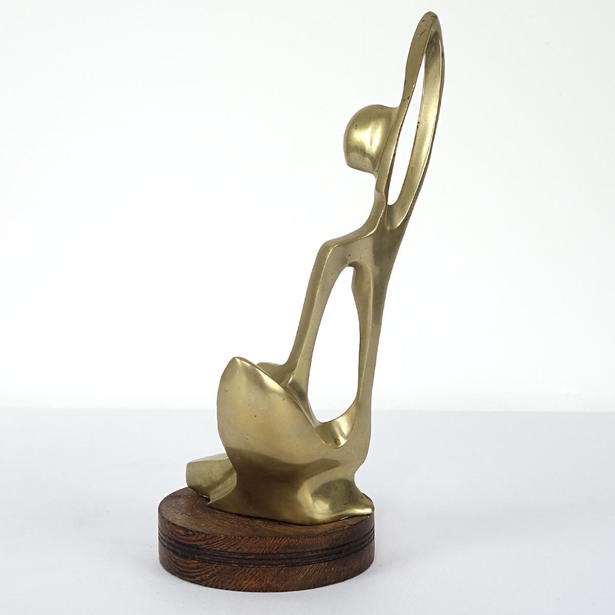 European Brass Statue of Stylized Mother with Child in Hagenauer Werkstätte Style For Sale