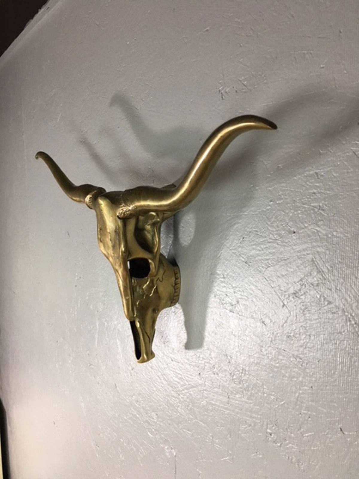 Sculpture of a steer in brass. Unknown artist. Unique. Weighs approximately 7 pounds.
