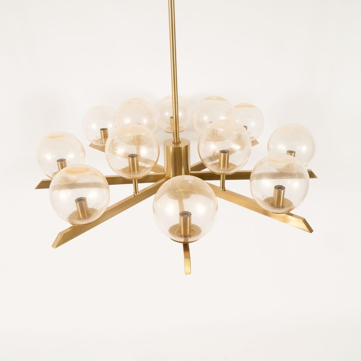 Contemporary Brass Sunburst Style Chandelier with Glass Globes For Sale