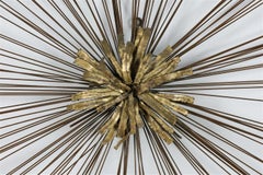 Brass Sunburst Wall Sculpture in the Manner of Curtis Jeré