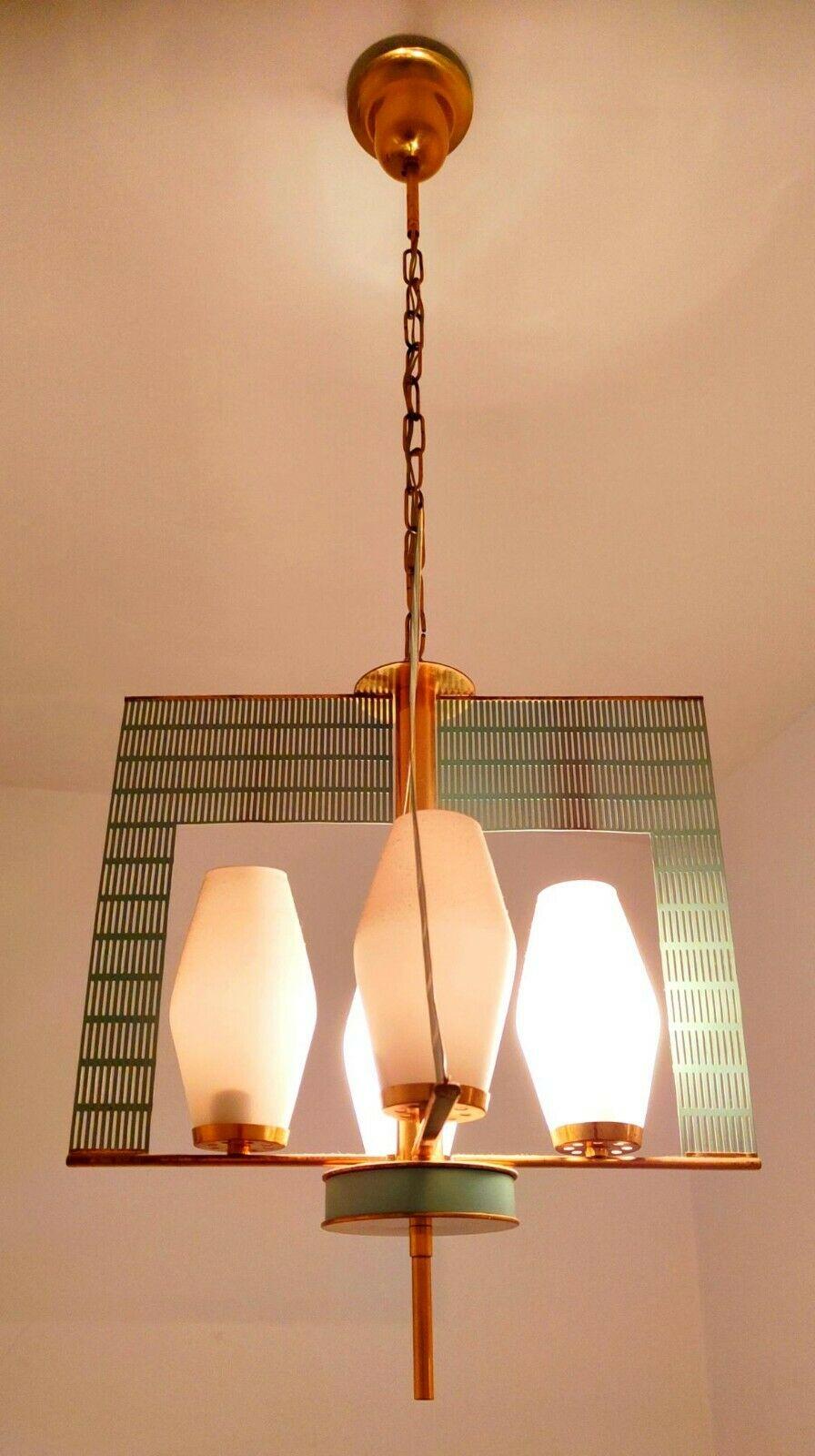 Rare original 60s chandelier, design mathieu mategot, made of sage green perforated sheet metal on a brass structure with four lights and as many opalines in white murano glass

It measures about 1 meter in height, about 40 cm in width and just