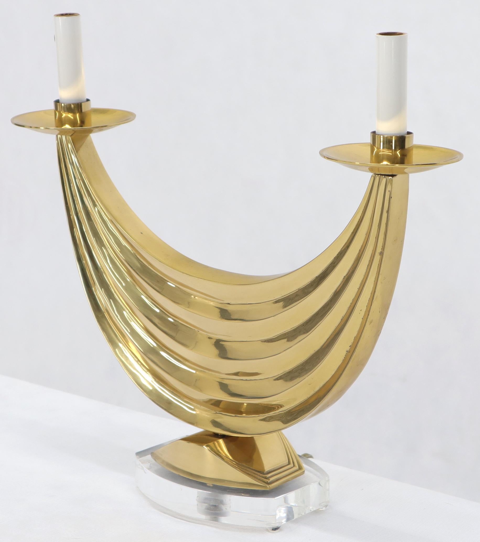 Very decorative swag shape brass base double light candle style table hall lamp.