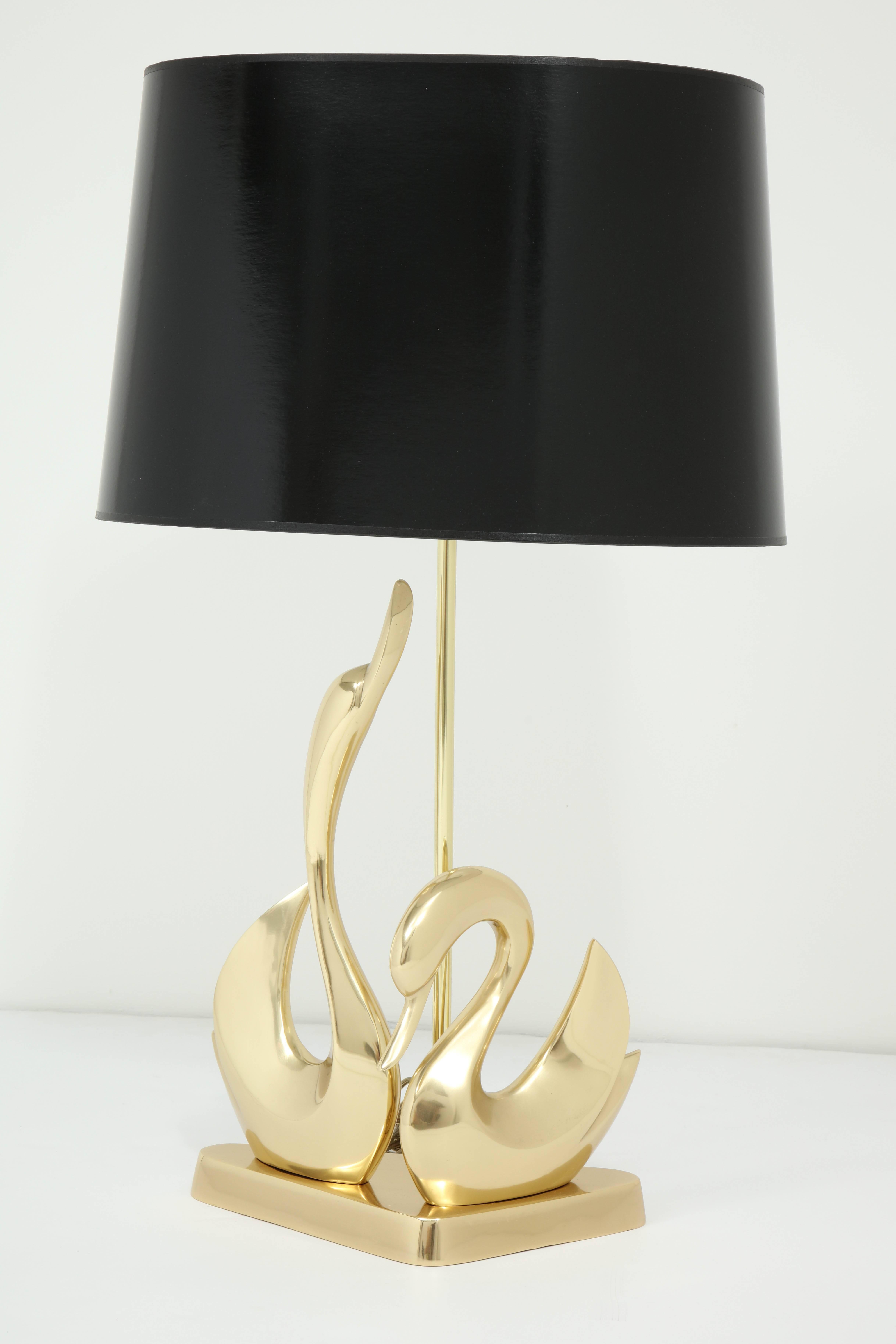 Decorative midcentury brass table lamp with two swans, circa 1950, Italy.