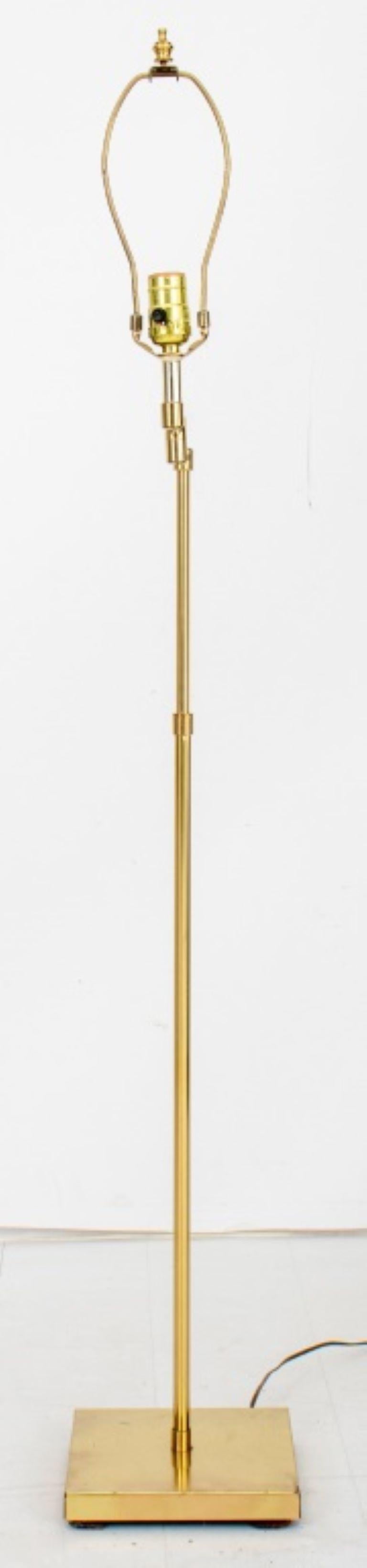 Brass swing-arm floor lamp, height adjustable, unmarked. Leaning to one side. 

Dealer: S138XX