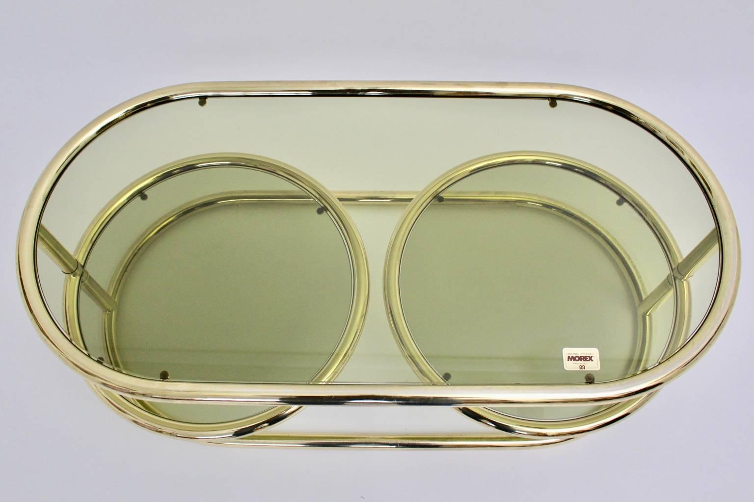 Italian Brass Swiveling Vintage Coffee Table Green Smoked Glass Plates by Morex 1970s