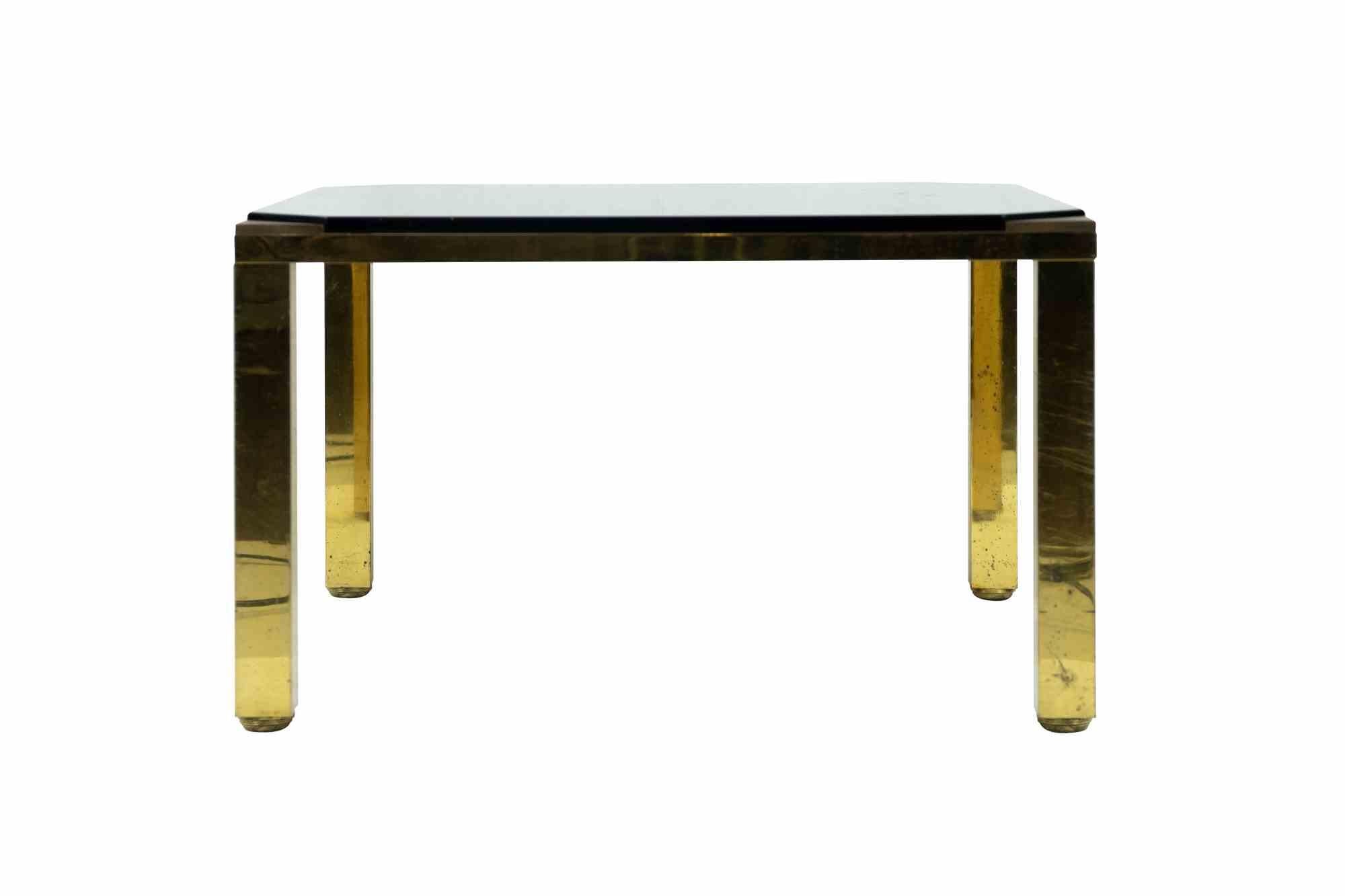 Brass Table is an original design furniture realized in the 1970s and attributed to Leonardo Falaschini.

A beautiful vintage table entirely realized in brass with glass top. 

Mint conditions except for some discoloring.