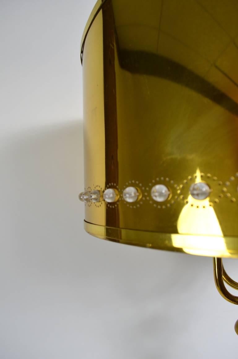 Glamorous brass, marble and crystal table lamp in clean, original and working condition.