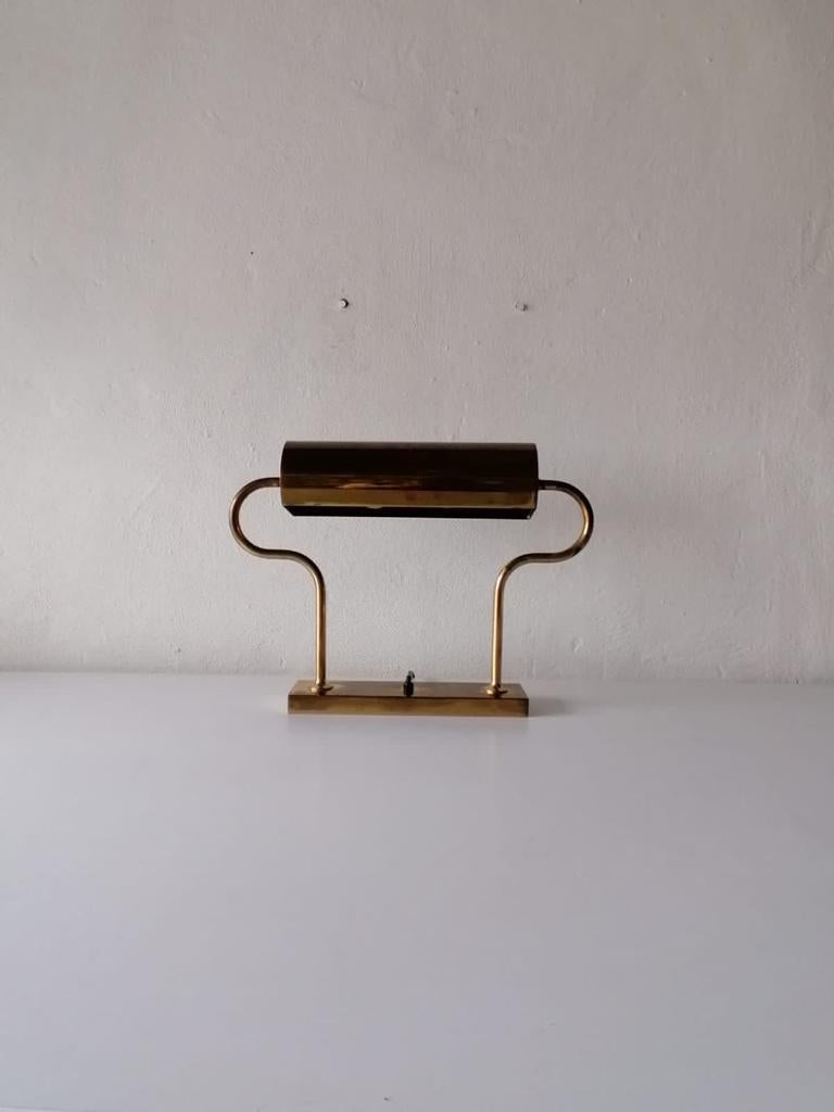 Solid Brass Adjustable Table Lamp by Florian Schulz, 1970s Germany In Good Condition For Sale In Hagenbach, DE
