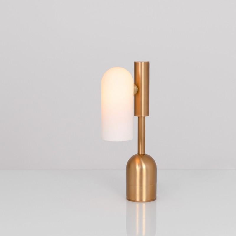 Odyssey 1 Brass table lamp by Schwung
Dimensions: W 10 x D 21 x H 44.6 cm
Materials: Brass, frosted glass

Finishes available: Black gunmetal, polished nickel, brass
Other sizes available

 Schwung is a german word, and loosely defined, means energy