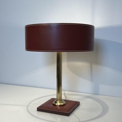 Brass Table Lamp with Burgundy Leather in the Style of Jacques Adnet. Circa 1950