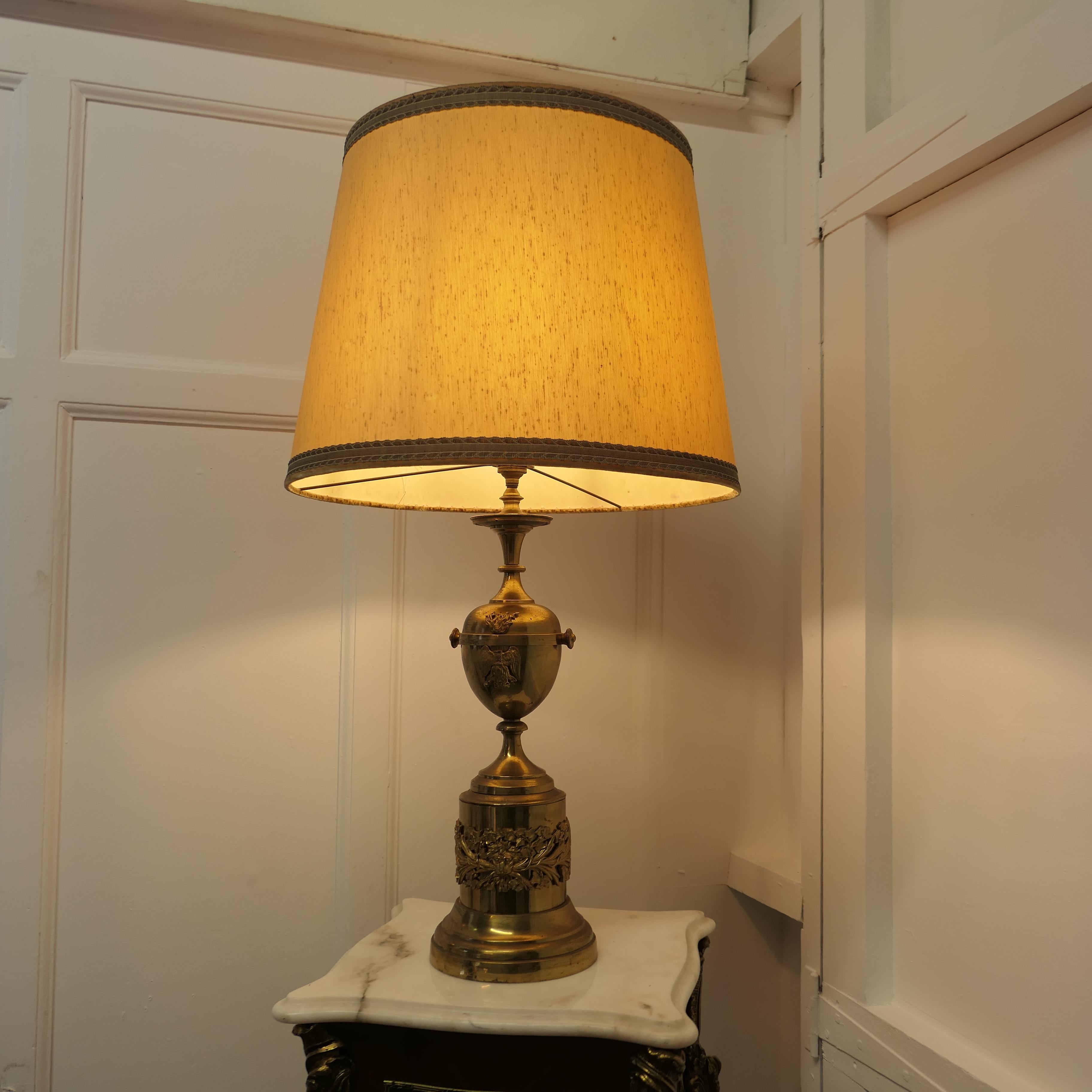 Classical Roman Brass Table Lamp with Italian Classical Mask and Mounts to the Base For Sale