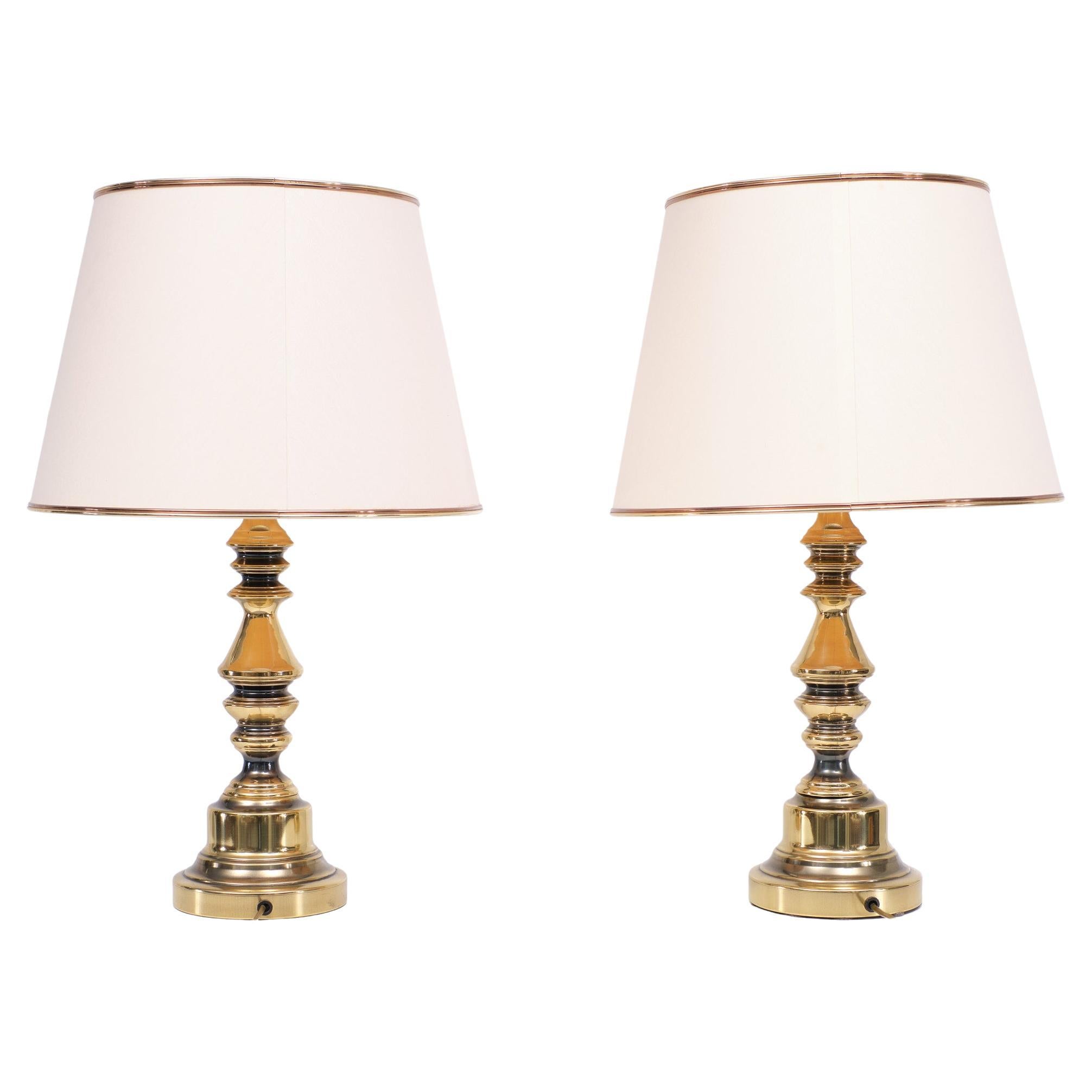 Very nice set Brass classic table lamps, comes with matching Shades.
1970s in a Hollywood Regency style.