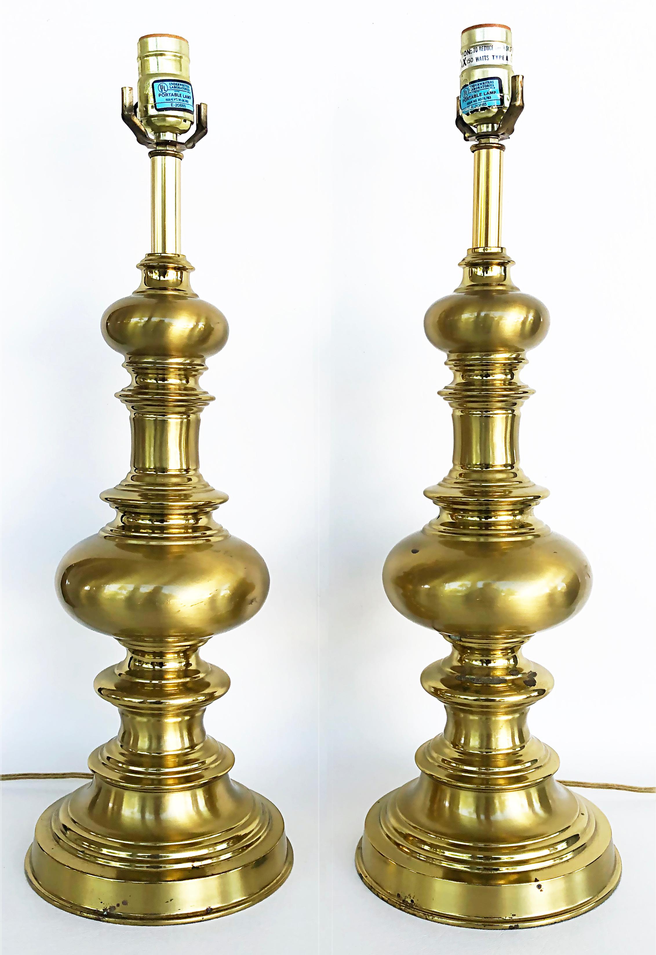 Brass Table Lamps, Pair

Offered for sale is a pair of turned brass table lamps.  Both lamps are wired and have a single socket that accommodates a standard bulb. They are in working condition. There are no shades included.

Height to the top of the
