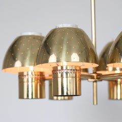 Lustre à bougies chauffe-plat en laiton, conçu par Hans-Agne Jakobsson, années 1960, Suède