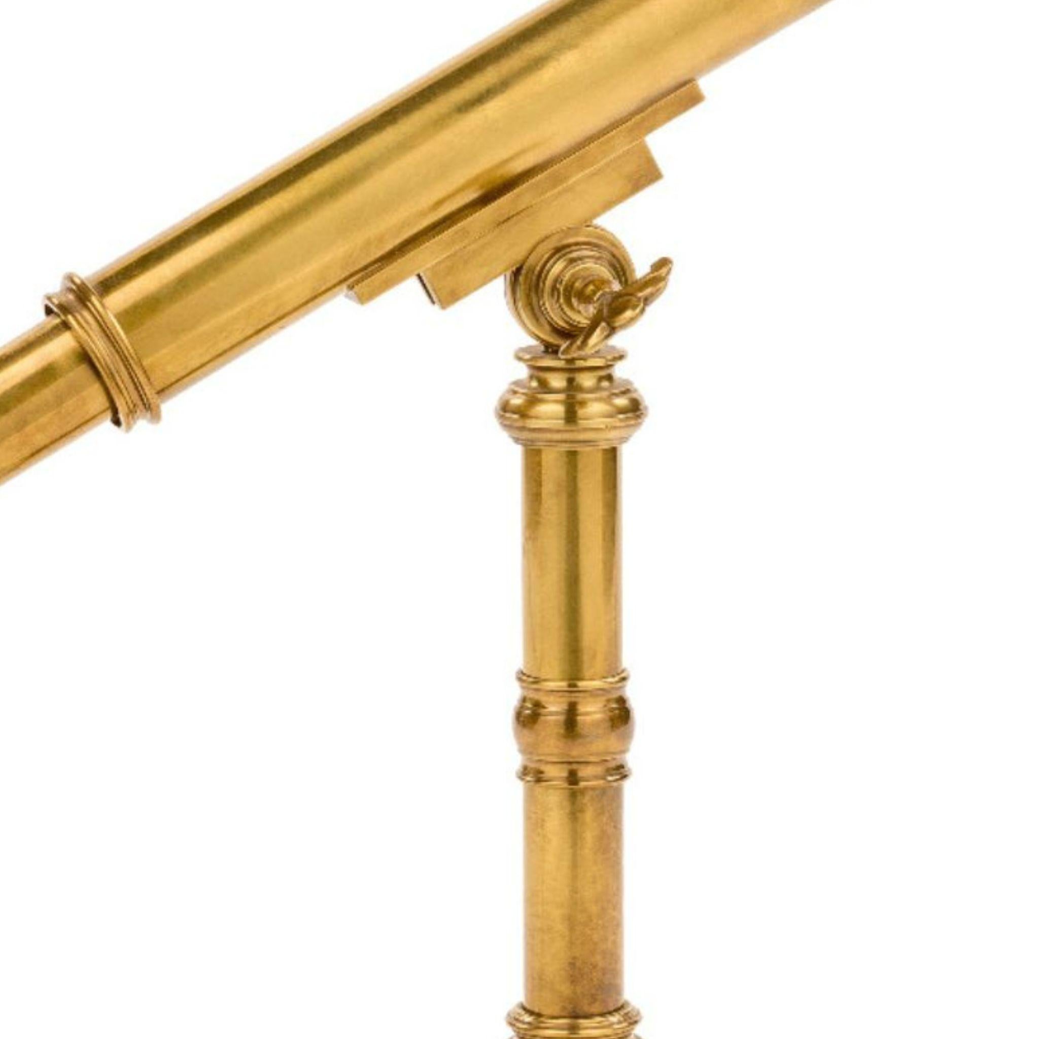 Get a glimpse into a world of elegance with our brass telescope. Beautifully crafted from high-quality brass, this telescope is the perfect addition to any nautical or coastal themed room. With its gleaming brass finish, it's not just functional but