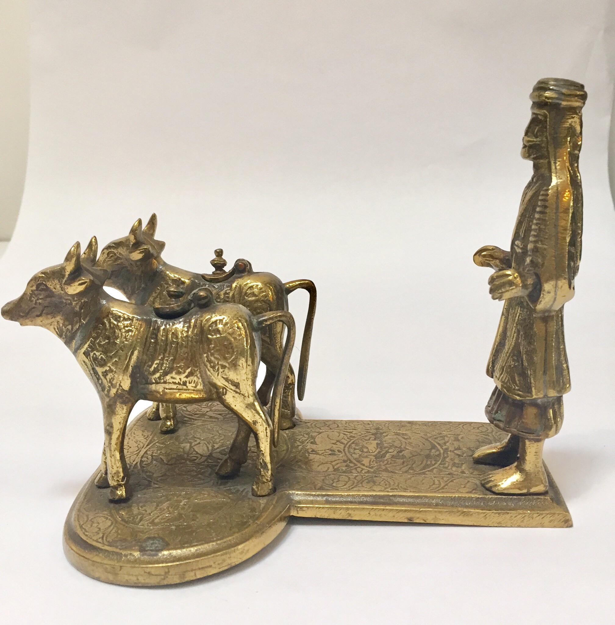 Brass Hindu Temple Oil Lamps Figures a Two Cows and Holly Man Standing For Sale 3