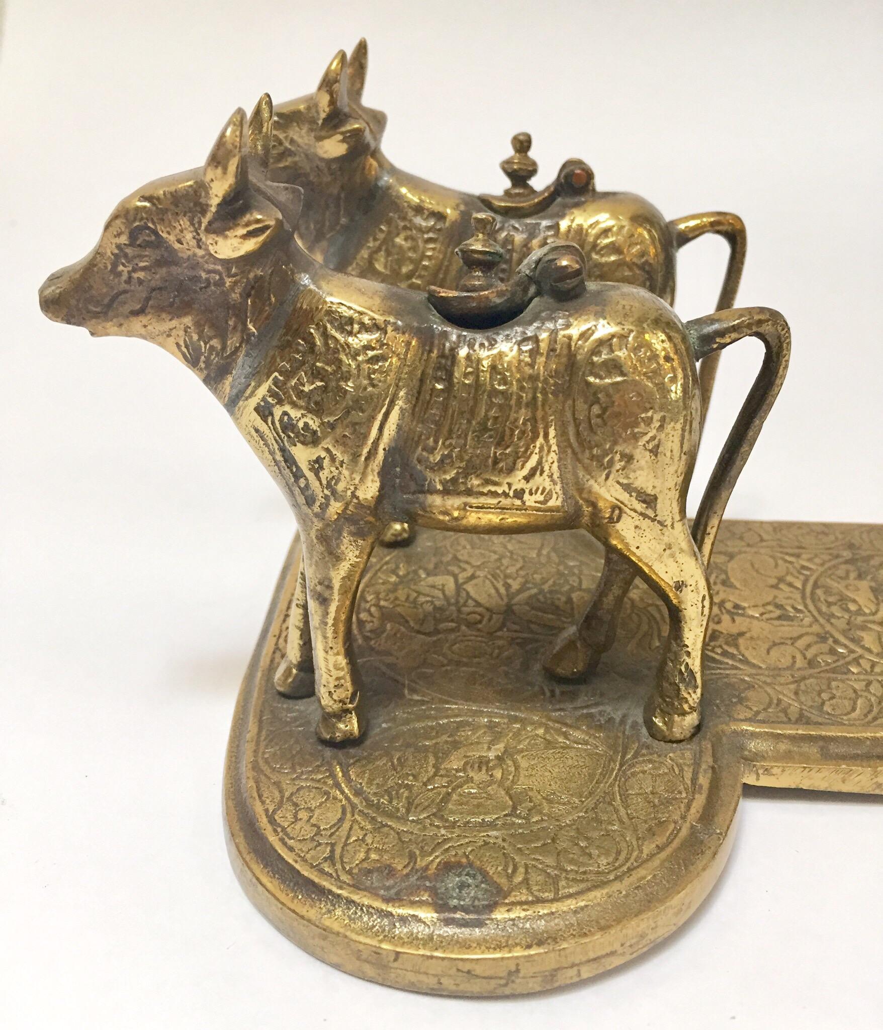 Brass Hindu Temple Oil Lamps Figures a Two Cows and Holly Man Standing For Sale 6