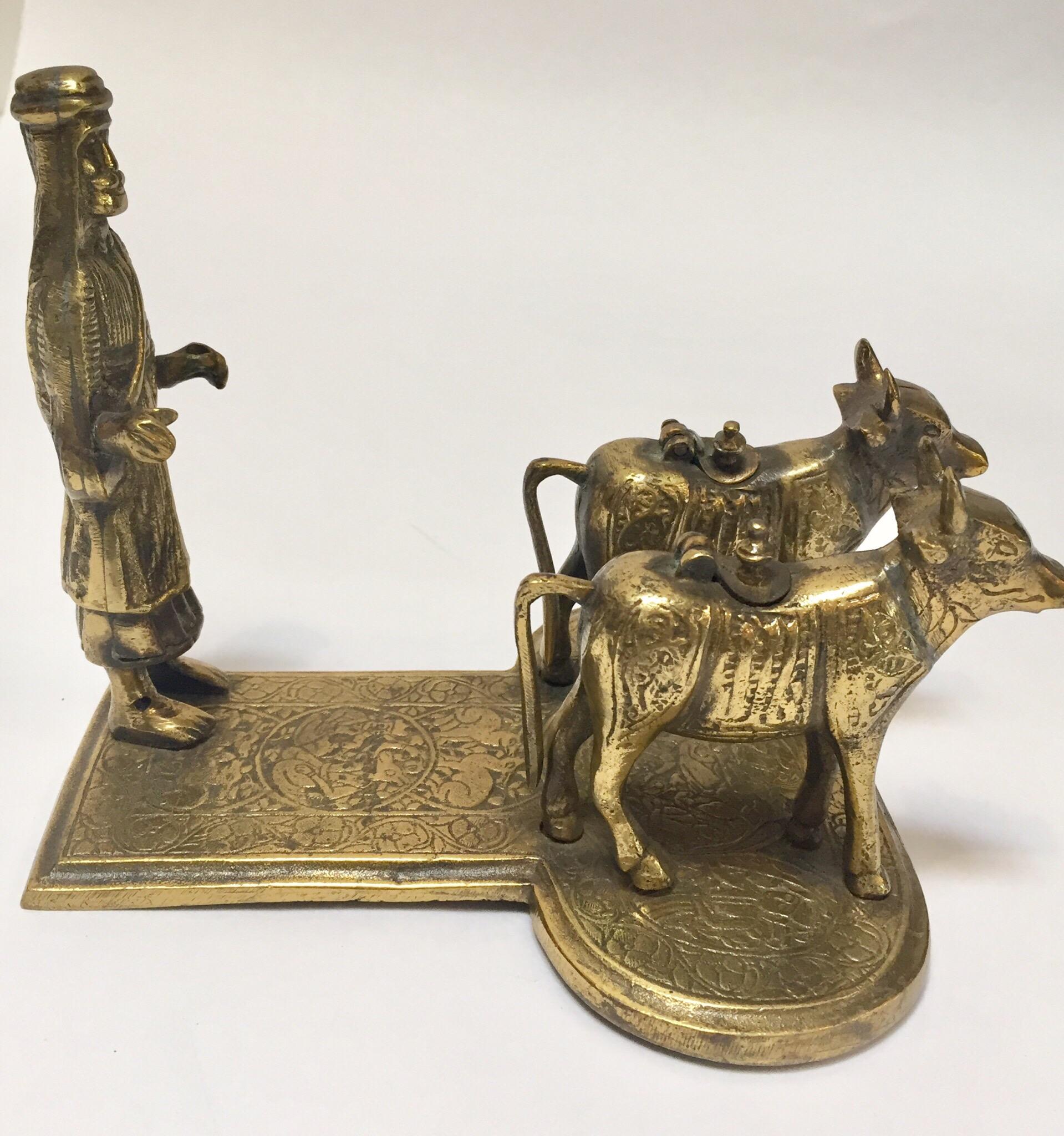 Brass Hindu Temple Oil Lamps Figures a Two Cows and Holly Man Standing For Sale 6