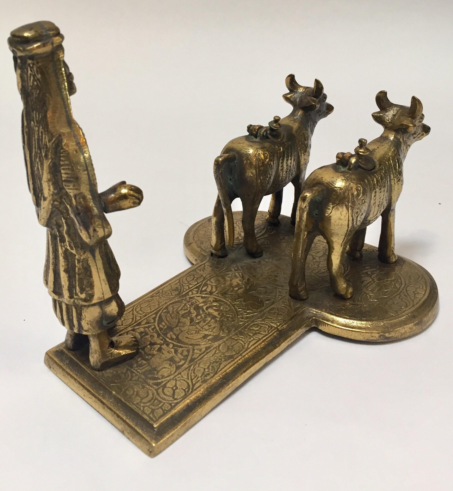 Brass Hindu Temple Oil Lamps Figures a Two Cows and Holly Man Standing For Sale 8