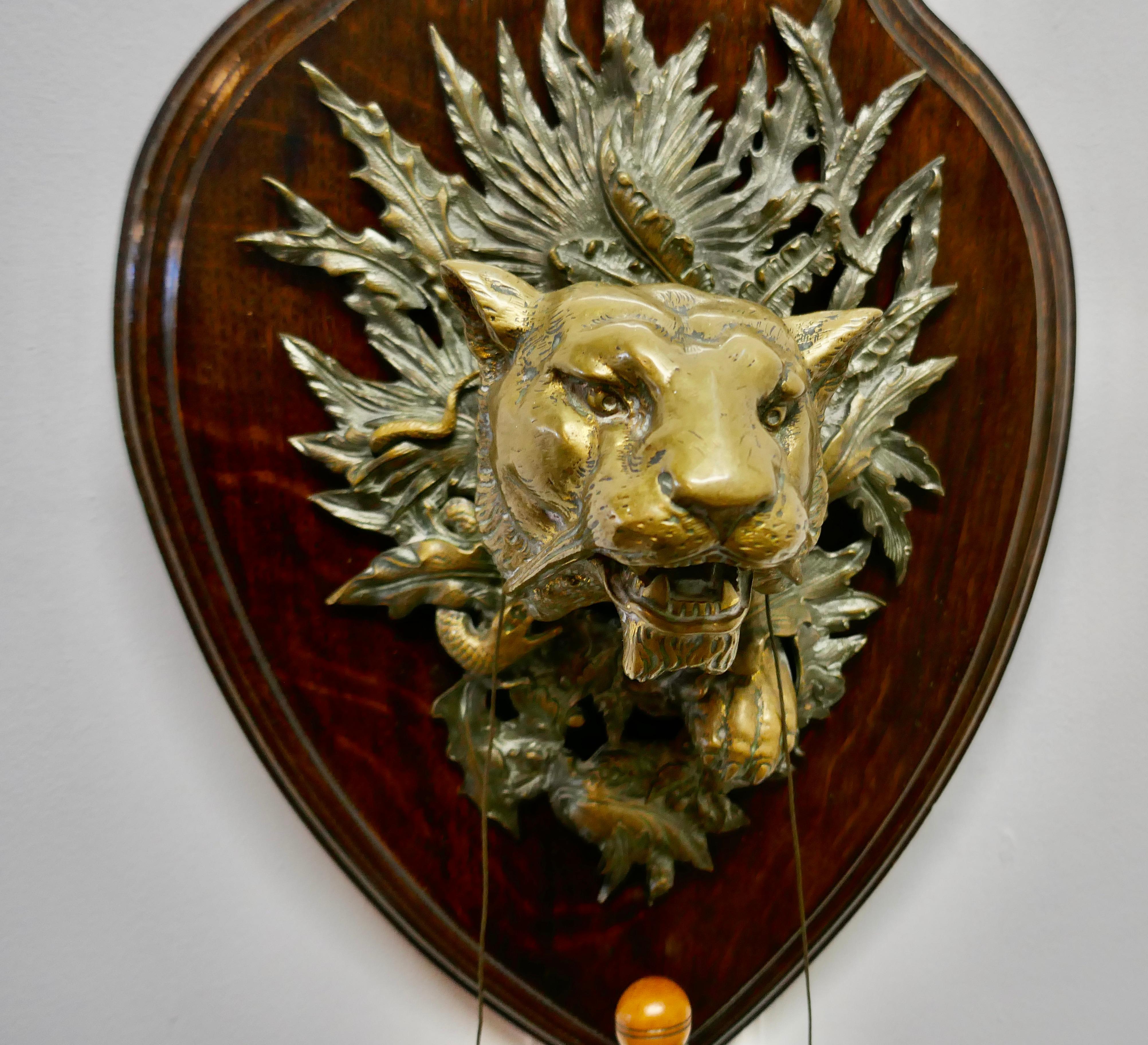 Brass tiger’s head dinner Gong by William Tonk & Son


This is a beautiful piece, the grass Gong is suspended from a very fierce Tiger’s head, the head is made in solid cast brass and set on an Oak plaque. The Tiger’s head is the finest quality