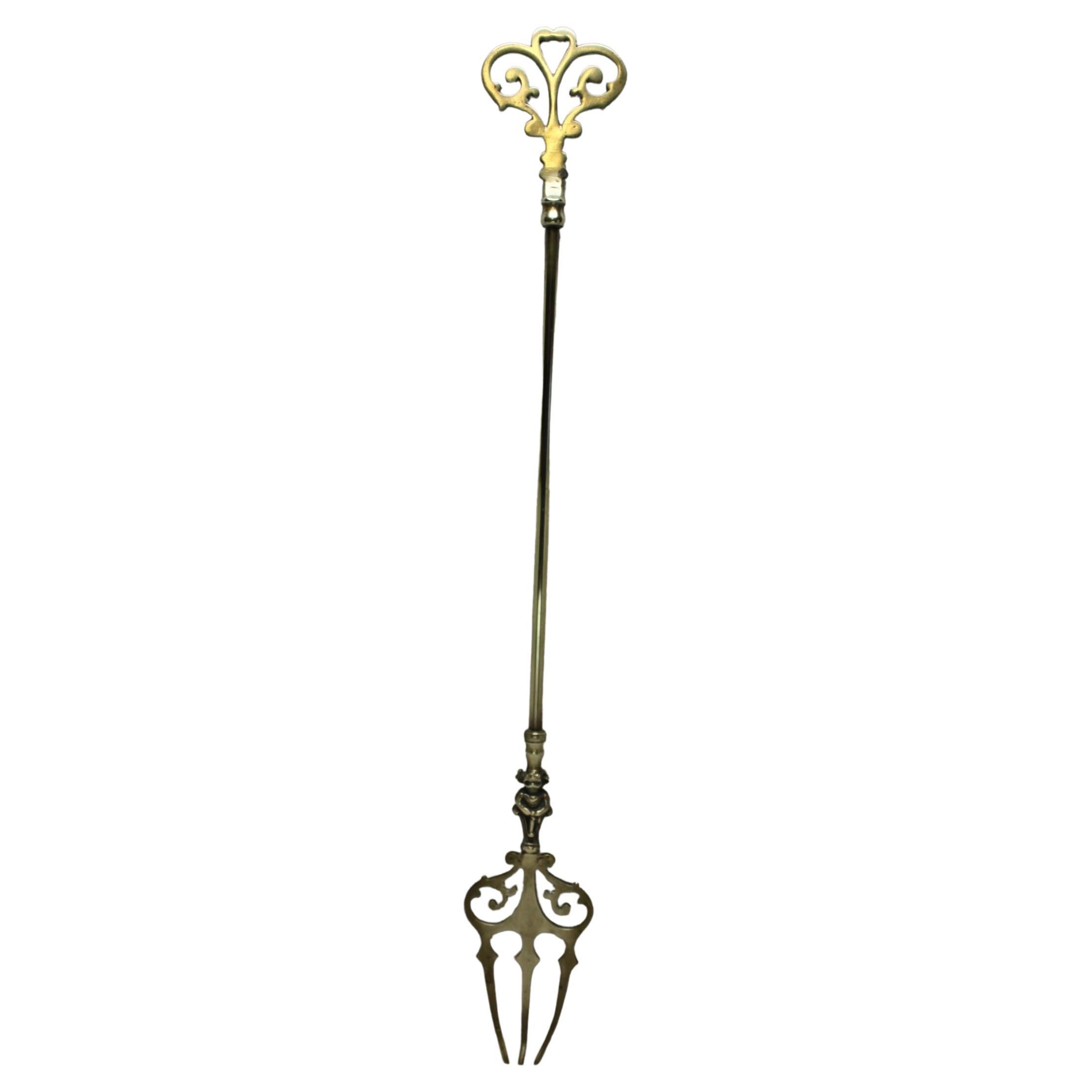 Brass Toasting Fork Decorated with Lincoln Imp For Sale