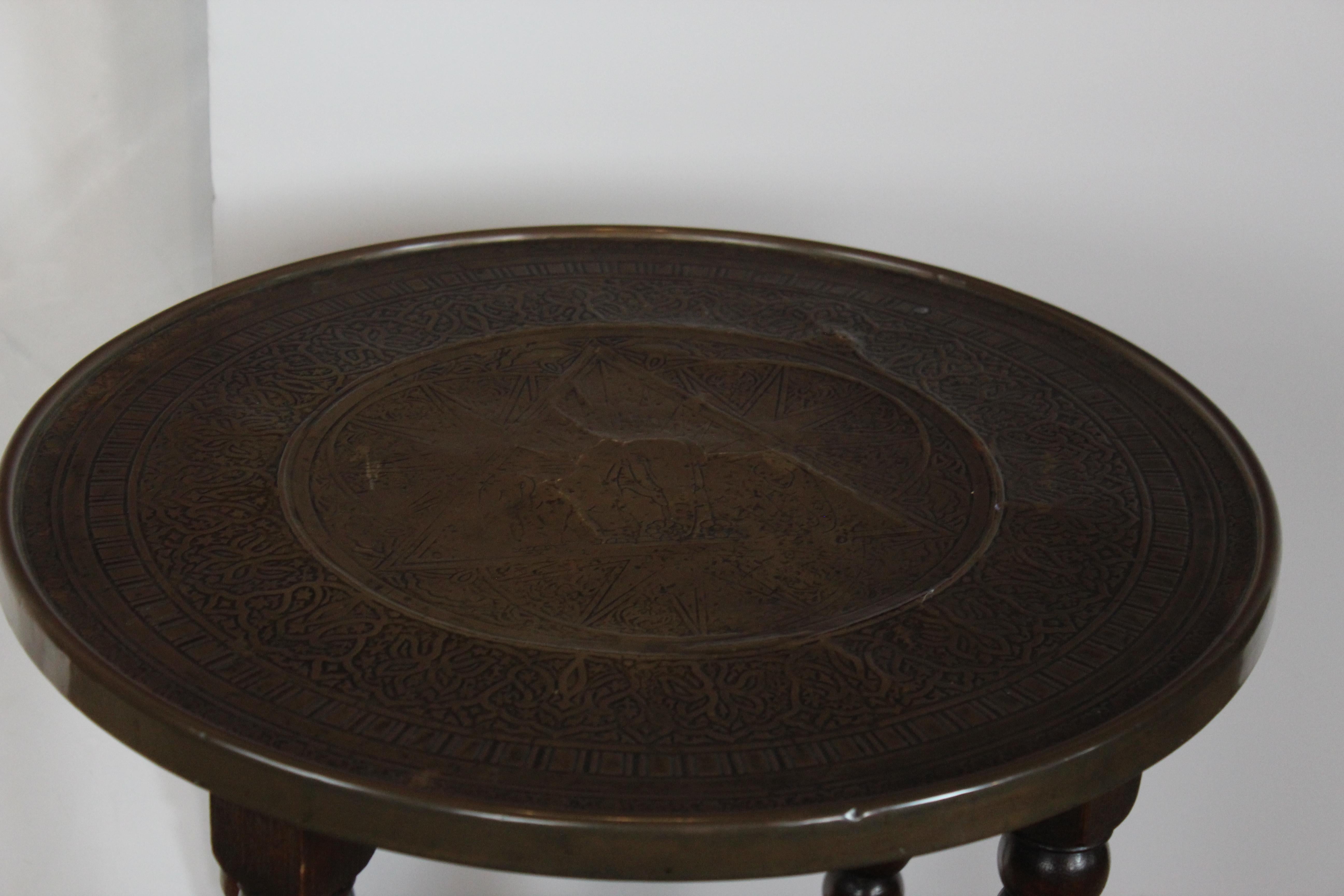 English brass top accent table with stretcher base.