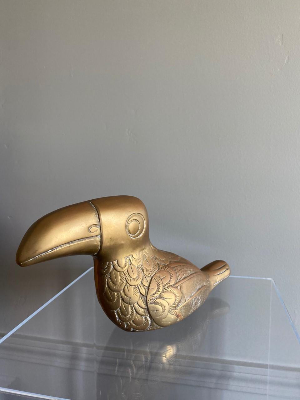 dolbi cashier brass bird