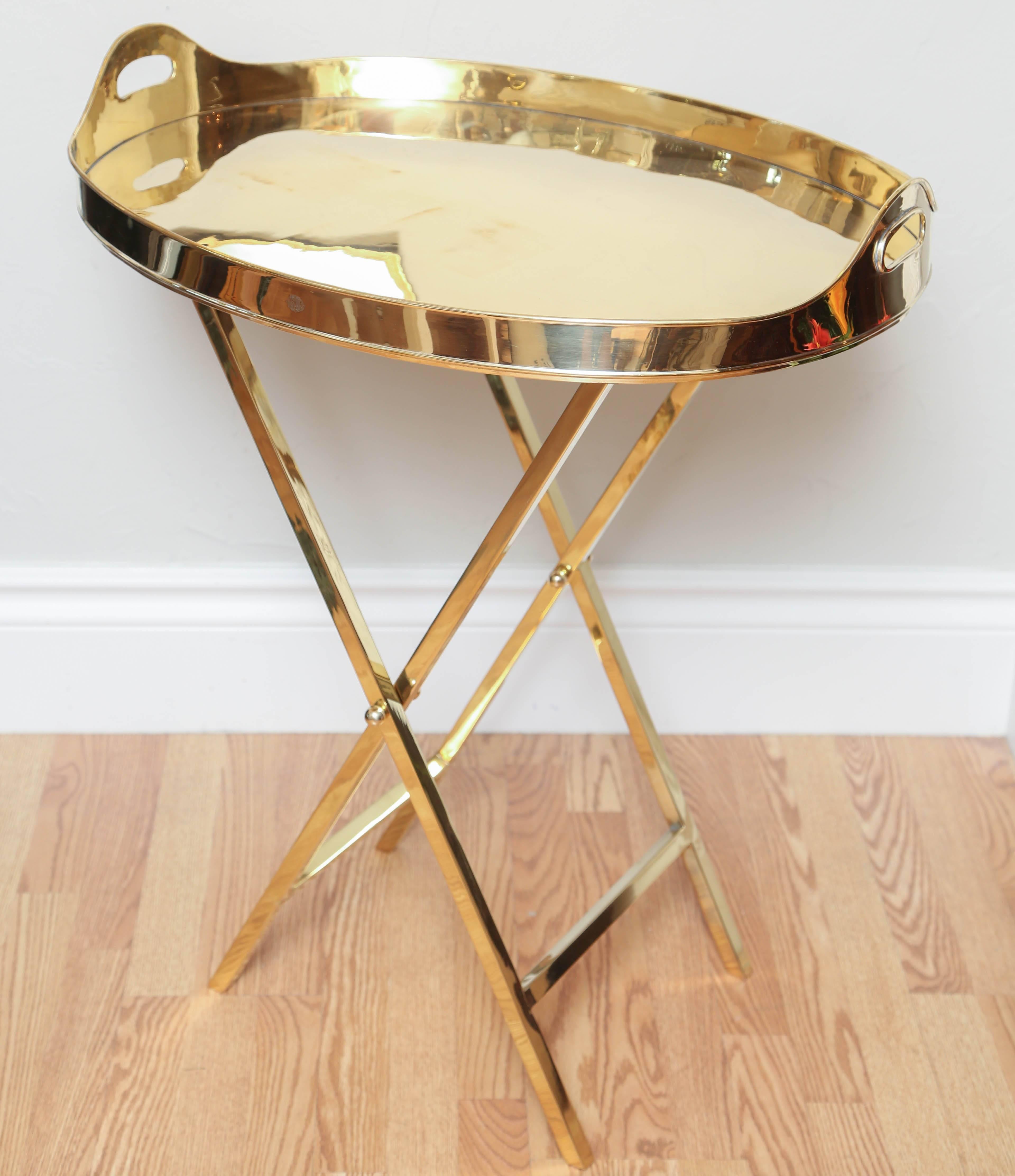 Large polished removable brass tray on matching stand.